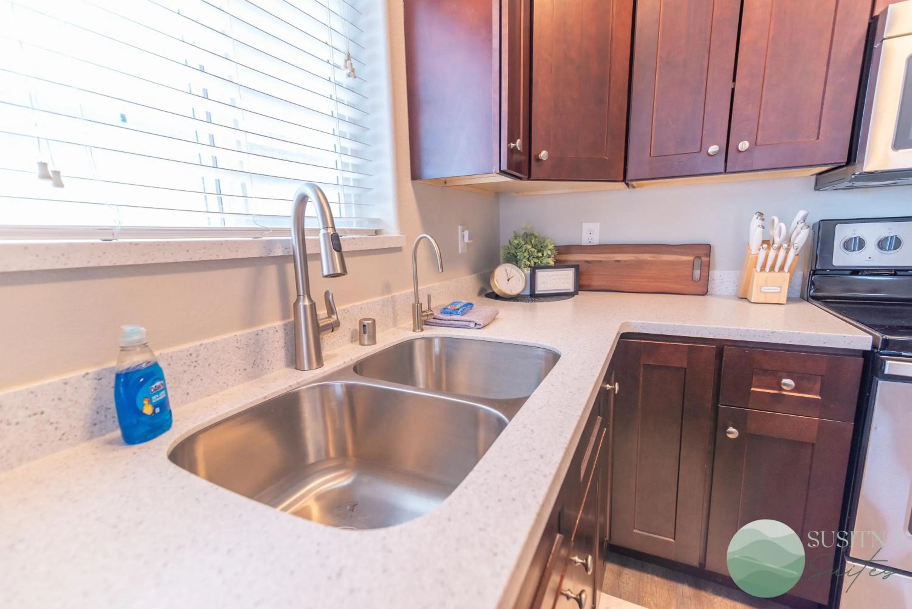 Kitchen or kitchenette in Susitna Suites