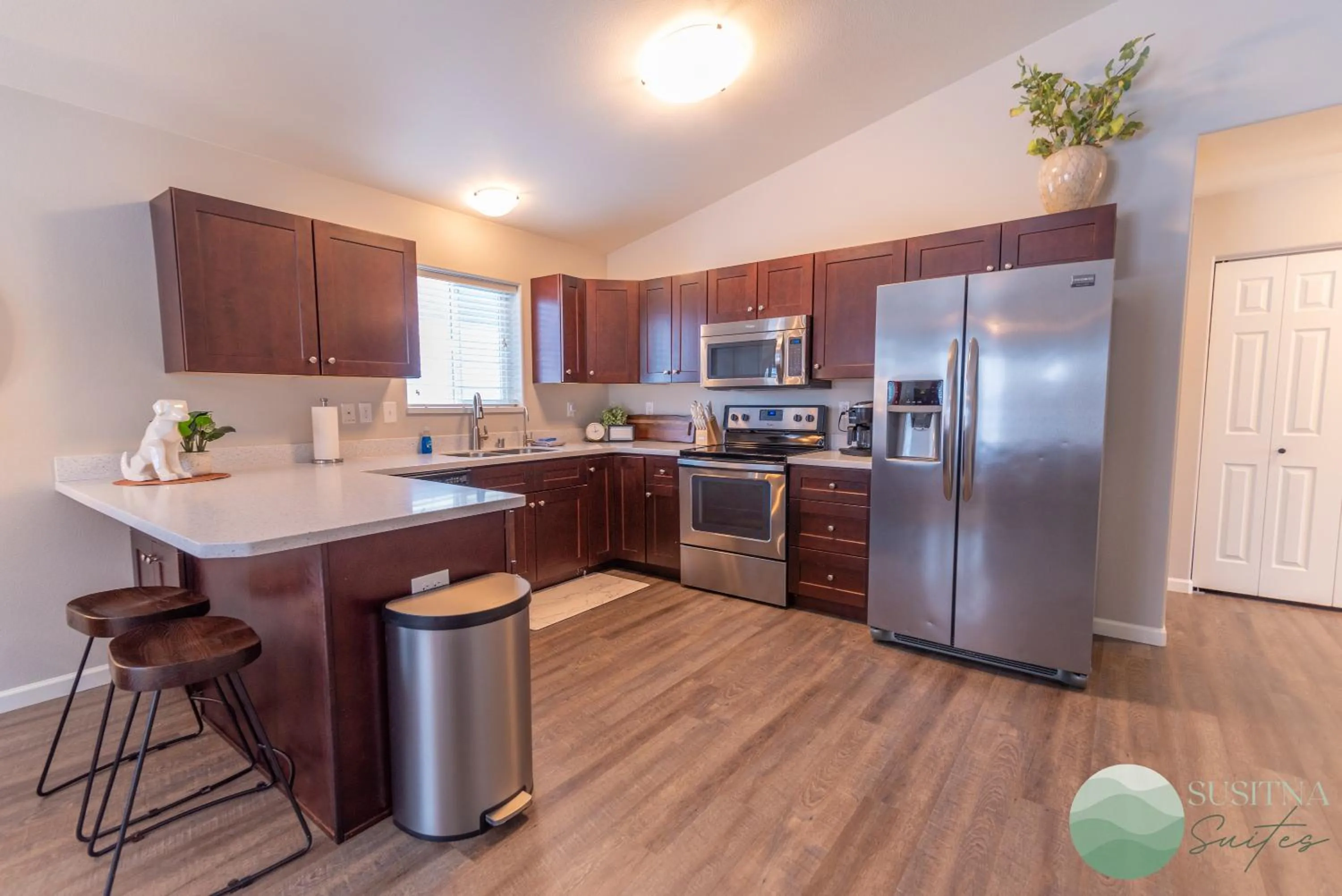 Kitchen or kitchenette in Susitna Suites