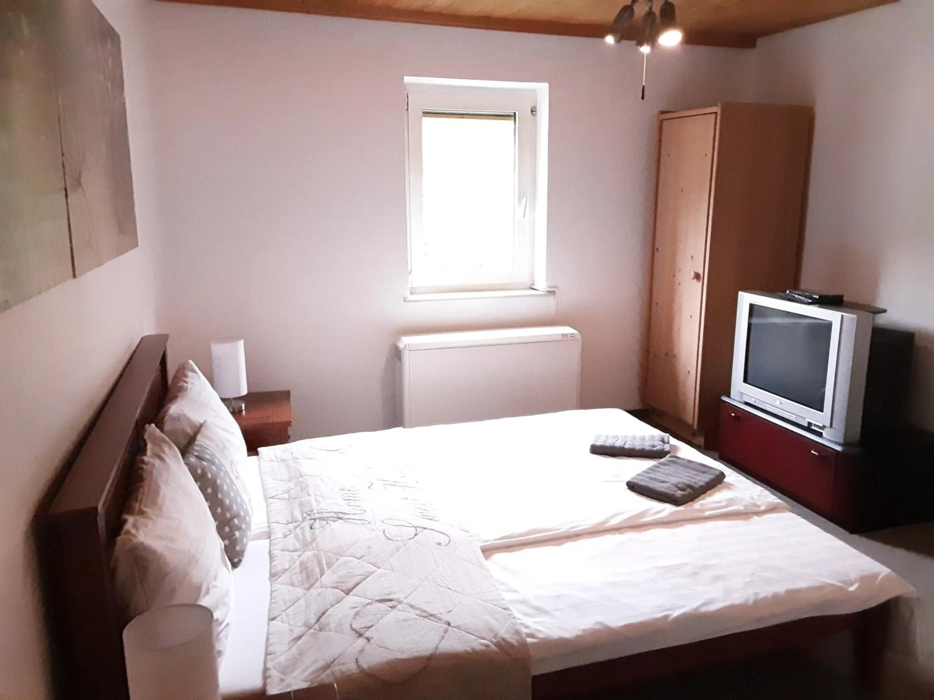 Bed in Apartment House Seerose self check-in