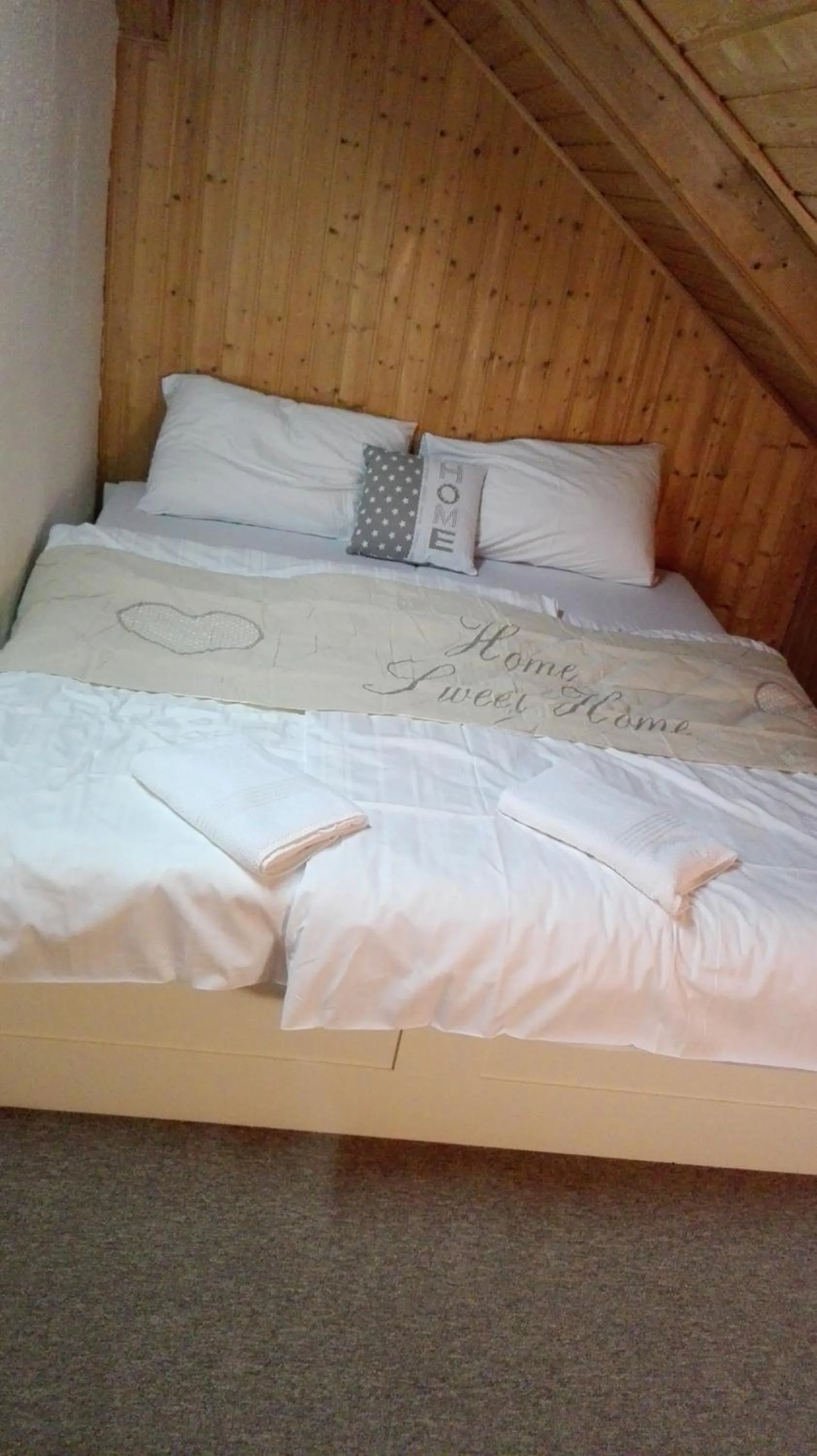 Bed in Apartment House Seerose self check-in