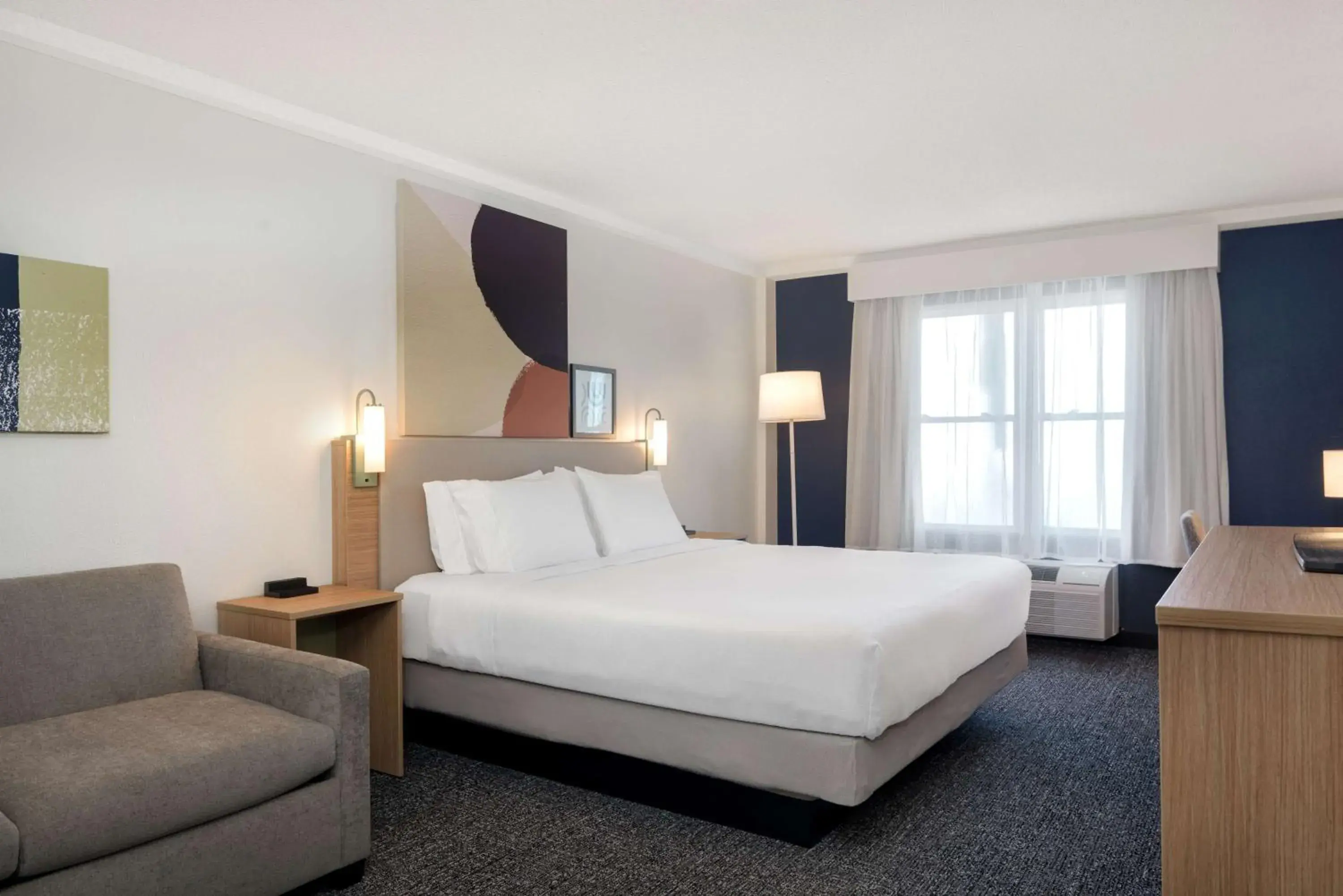 Living room, Bed in Spark By Hilton Orangeburg Living room, Bed in Spark By Hilton Orangeburg