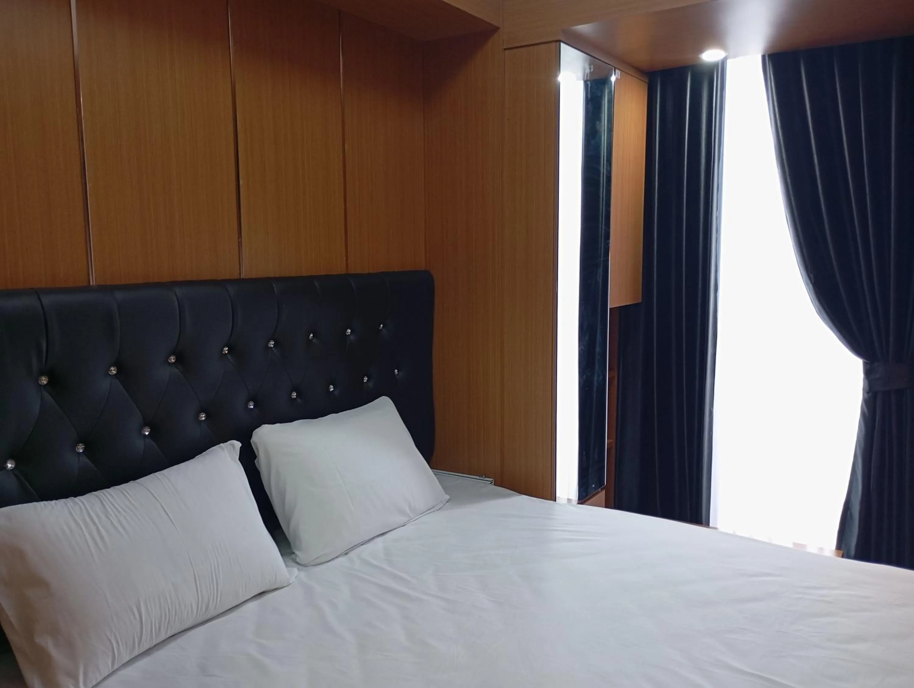 Bedroom, Bed in SleepRest @ Pollux Habibie