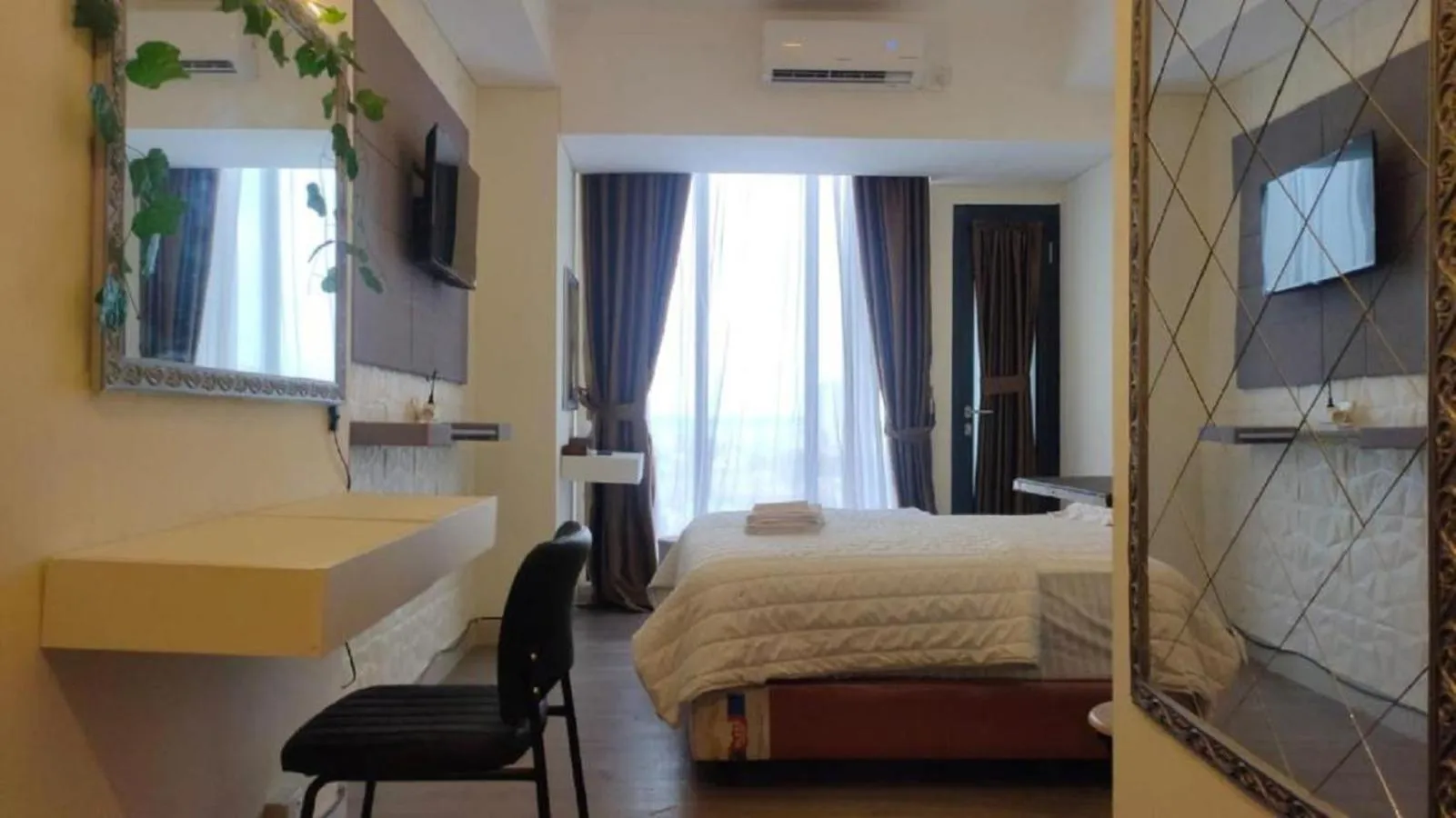 Seating area, Bed in SleepRest @ Pollux Habibie