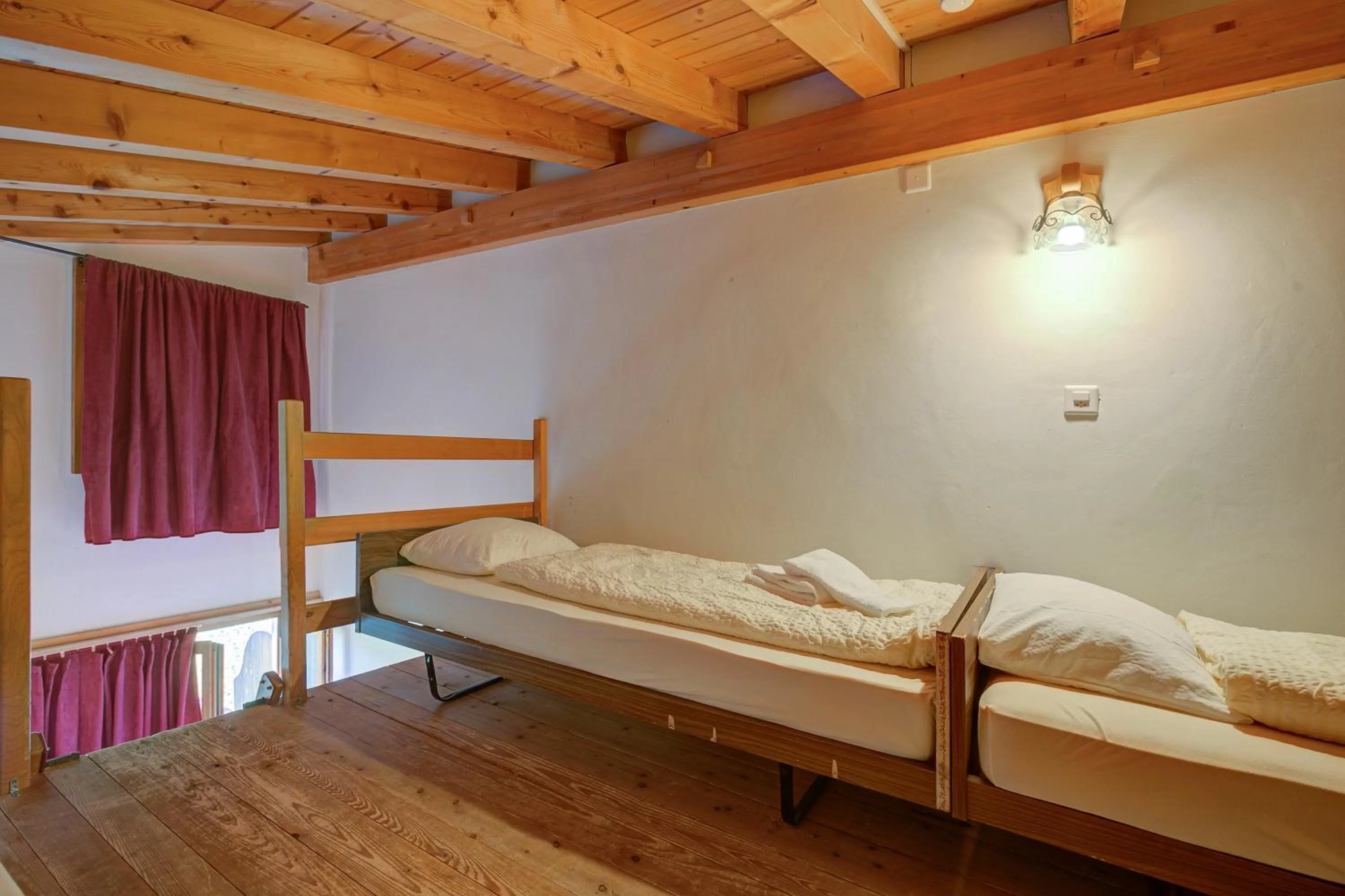 Bed in Hotel Relais Alpin