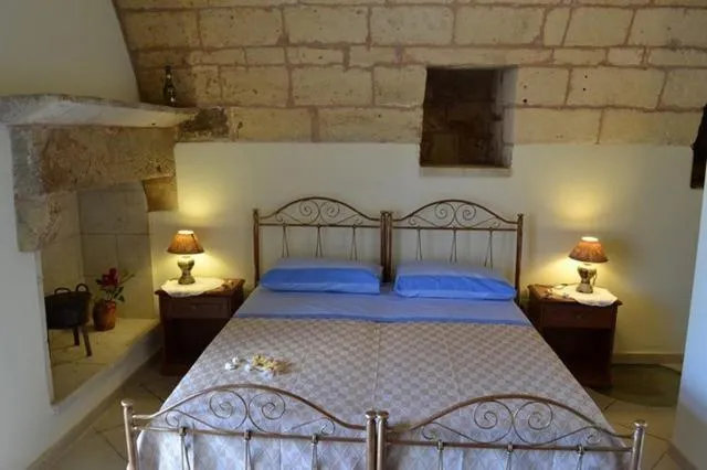 Photo of the whole room, Bed in Masseria Cinti