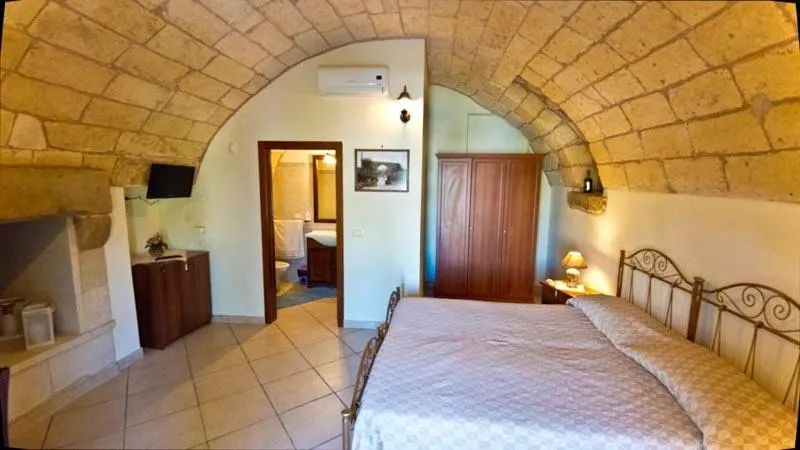 Photo of the whole room, Bed in Masseria Cinti