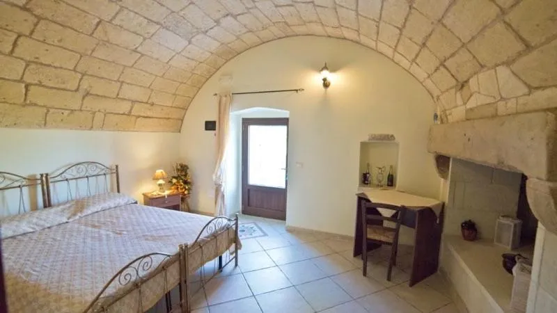 Photo of the whole room, Bed in Masseria Cinti