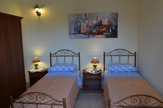 Photo of the whole room, Bed in Masseria Cinti
