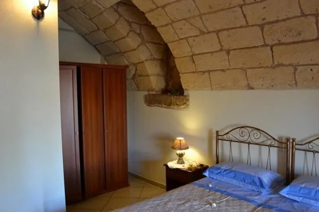 Photo of the whole room, Bed in Masseria Cinti