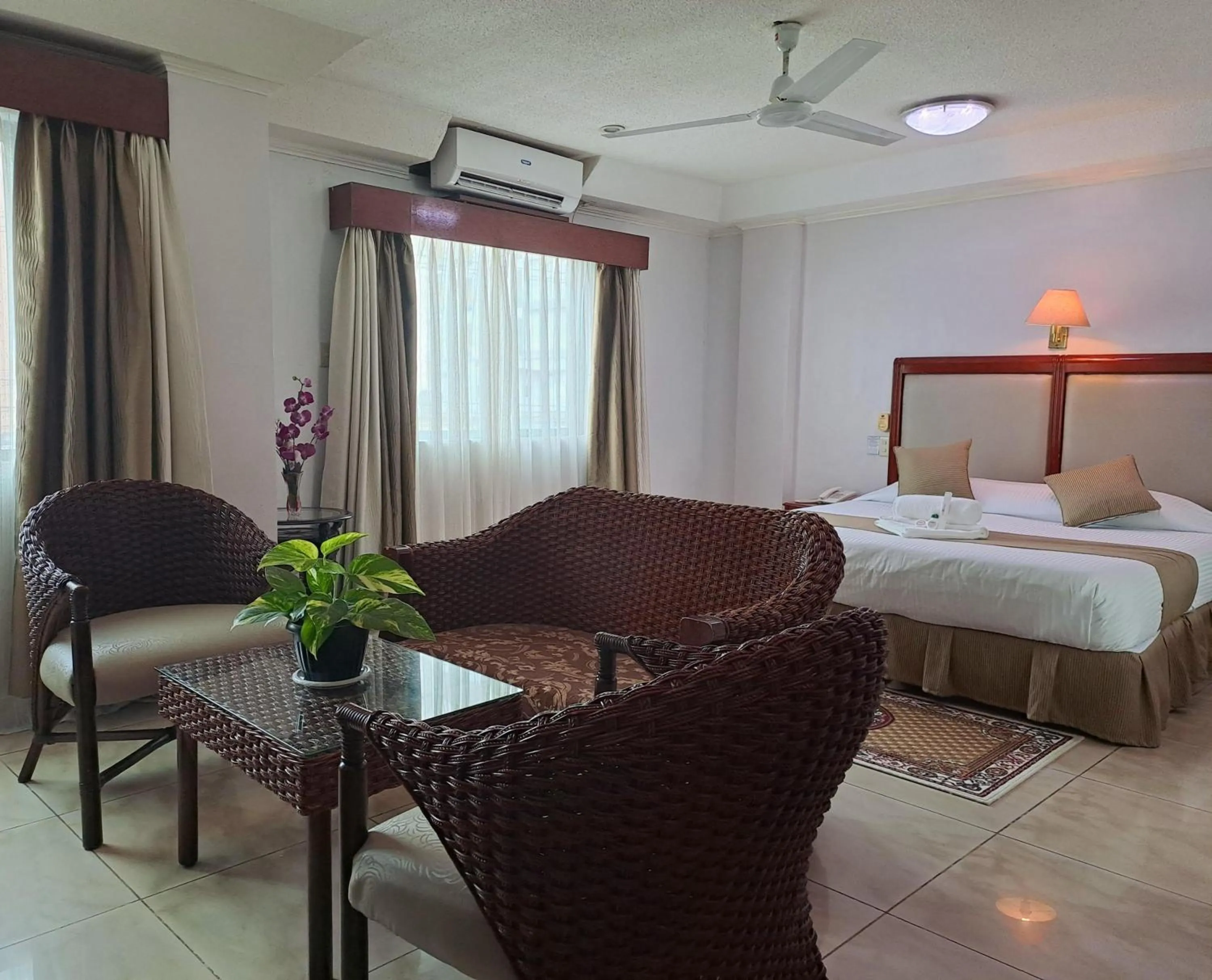 Photo of the whole room, Bed in Wild Orchid Resort