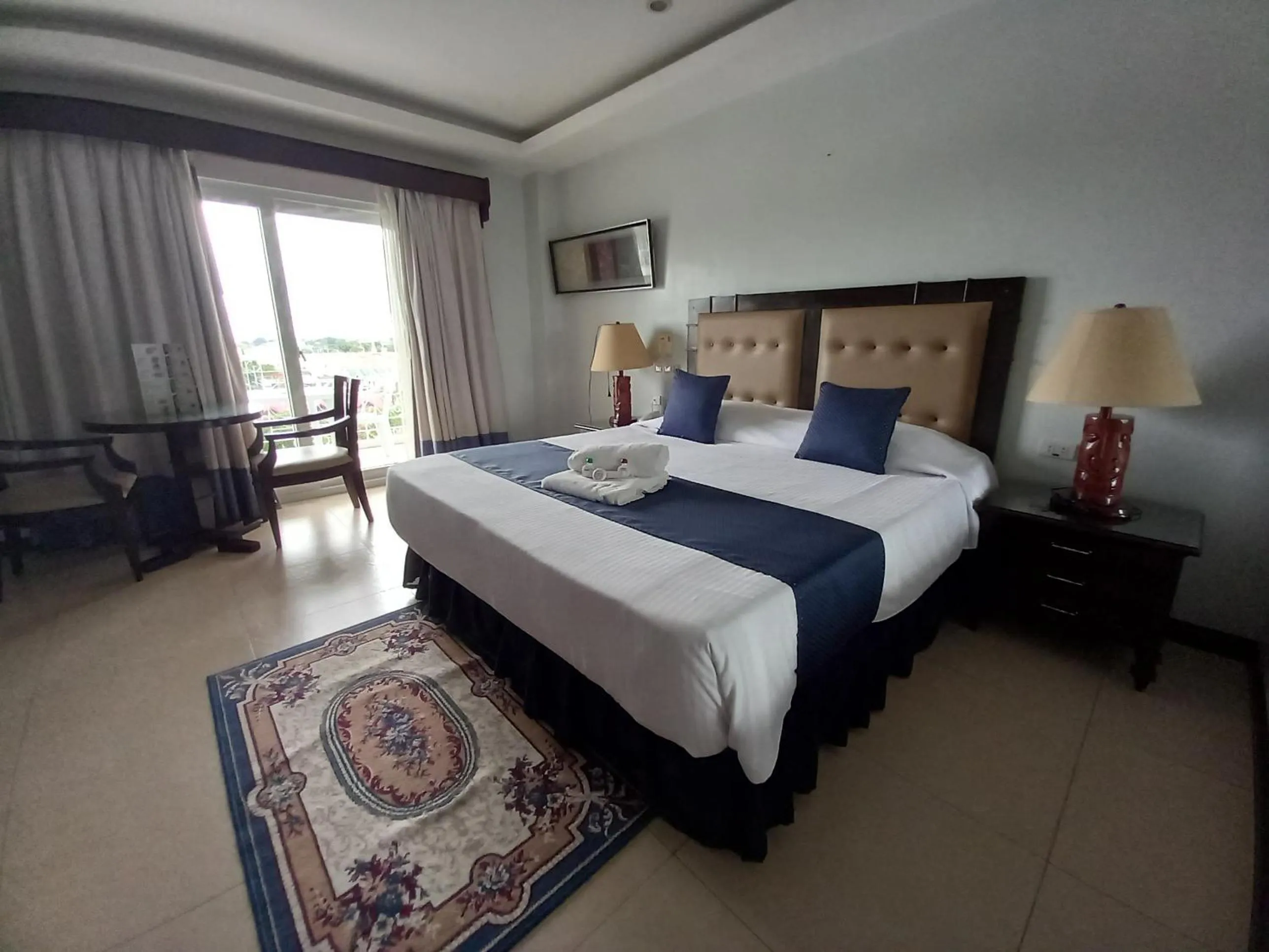 Bedroom, Bed in Wild Orchid Resort