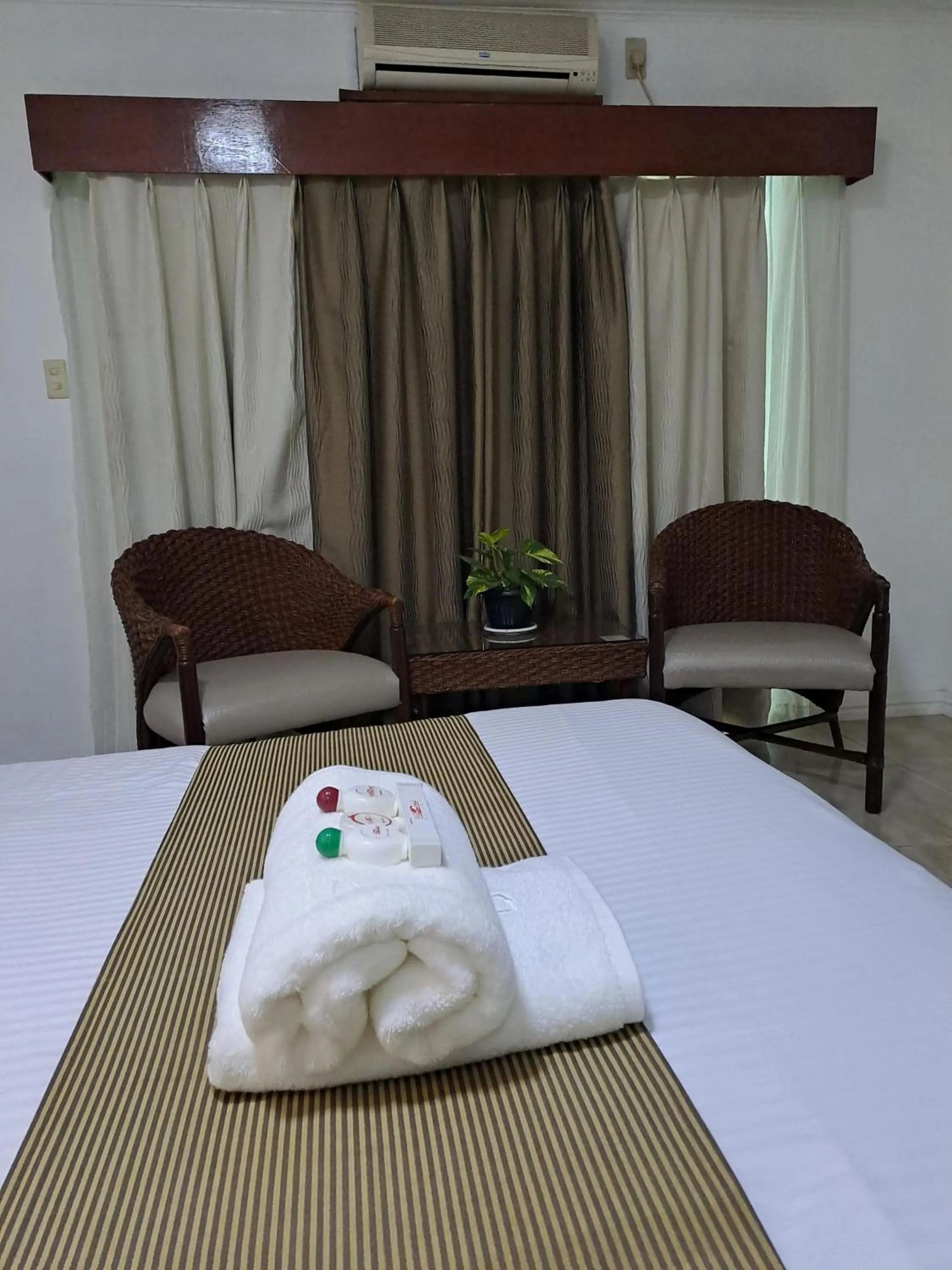 Photo of the whole room, Bed in Wild Orchid Resort