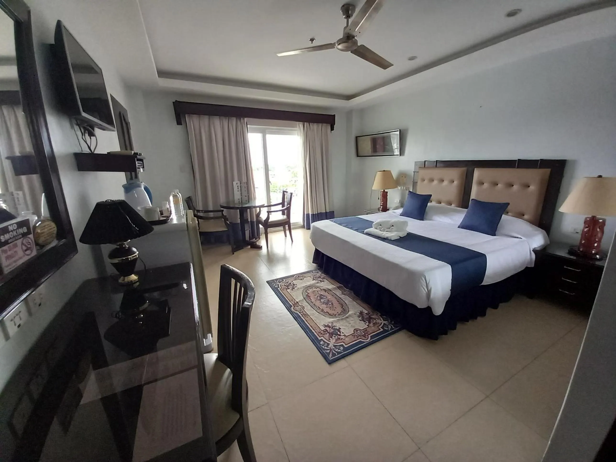 Photo of the whole room, Bed in Wild Orchid Resort