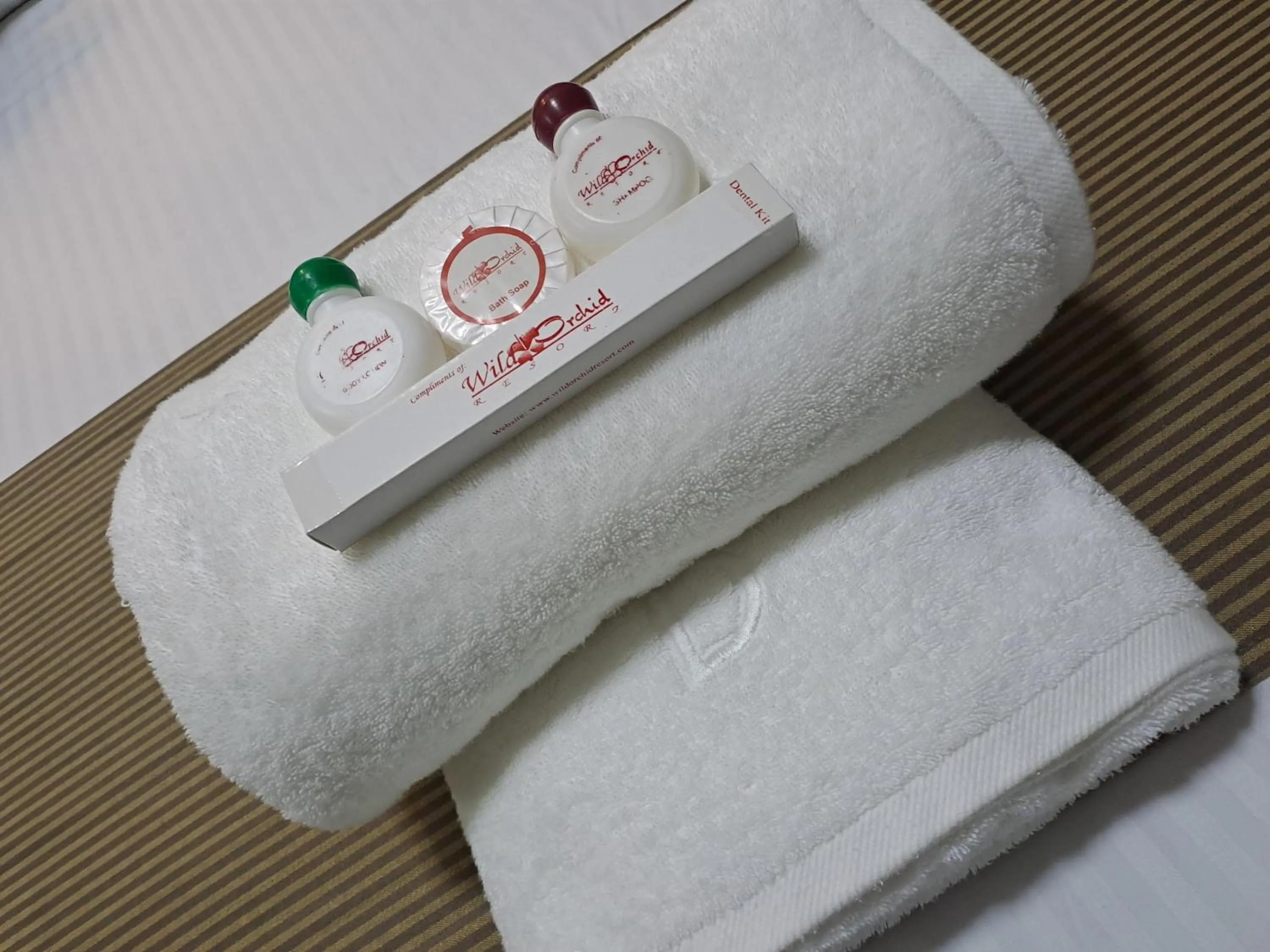 Property logo or sign in Wild Orchid Resort