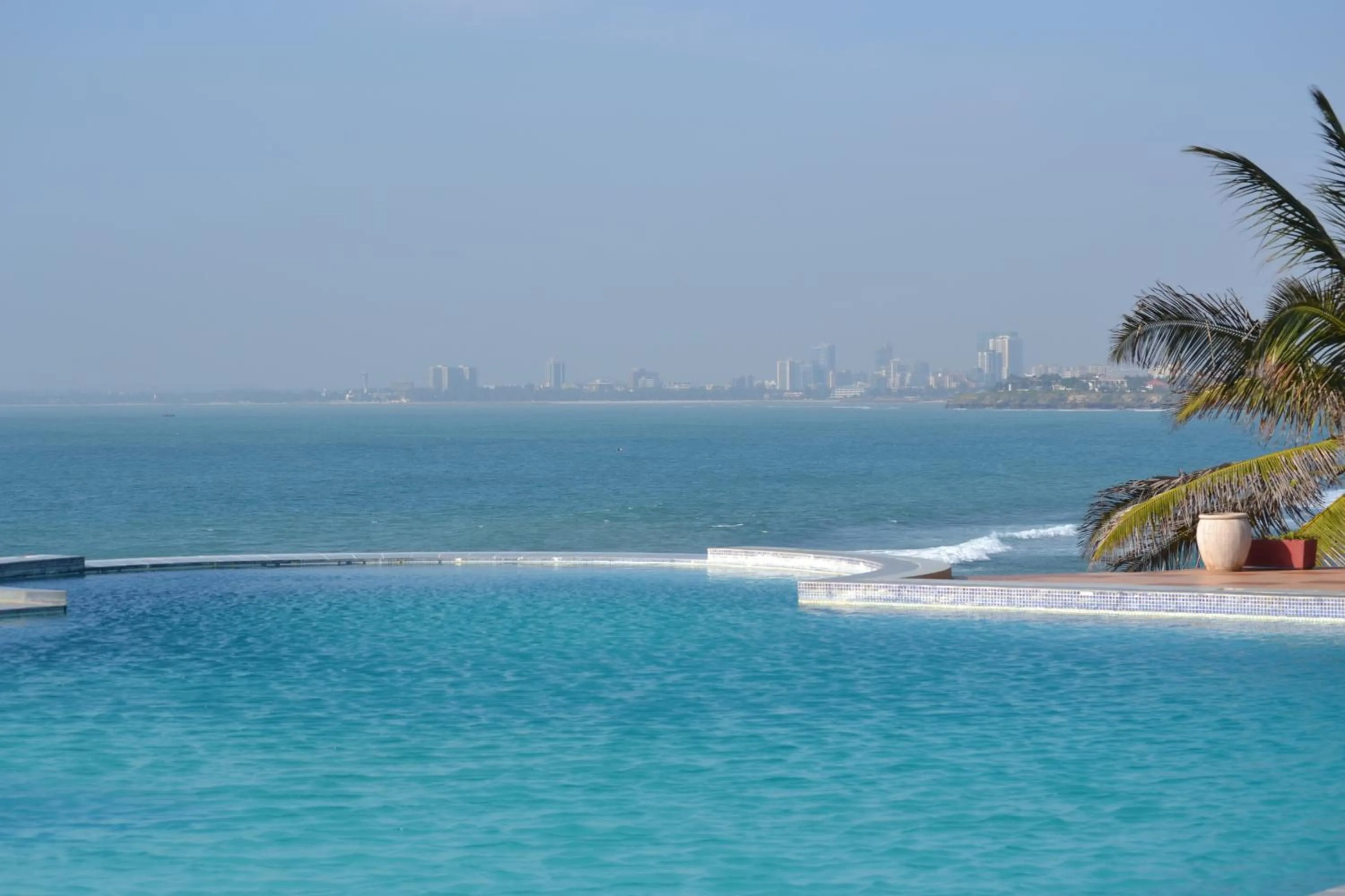 Swimming pool, Beach in Golden Tulip Tanzania