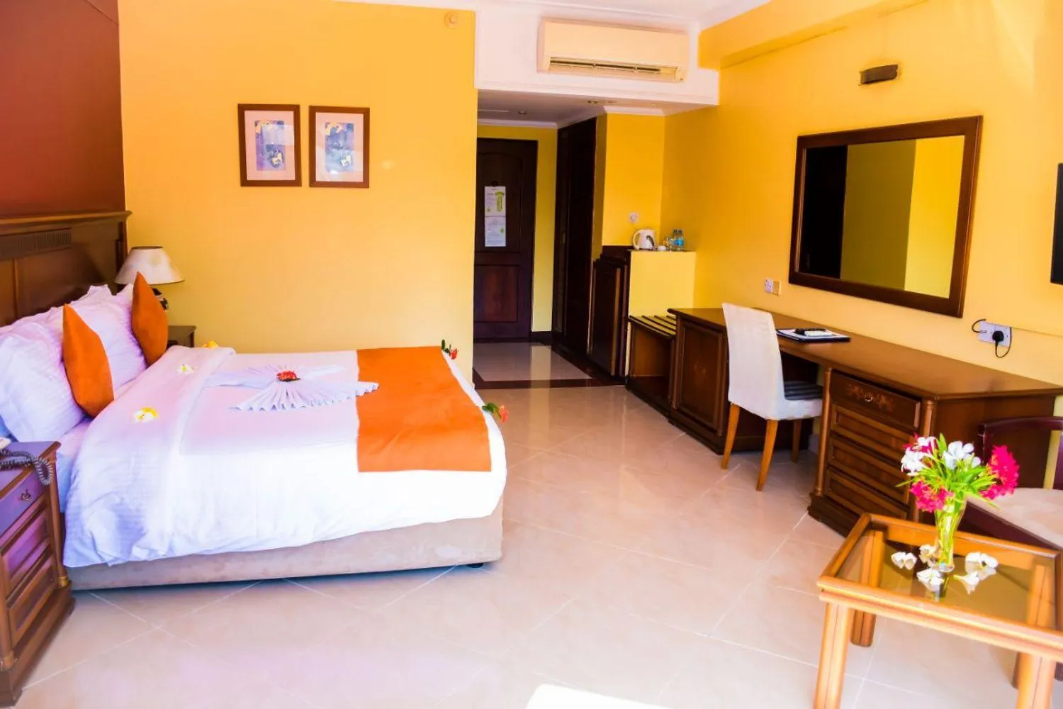 Bed in Golden Tulip Tanzania