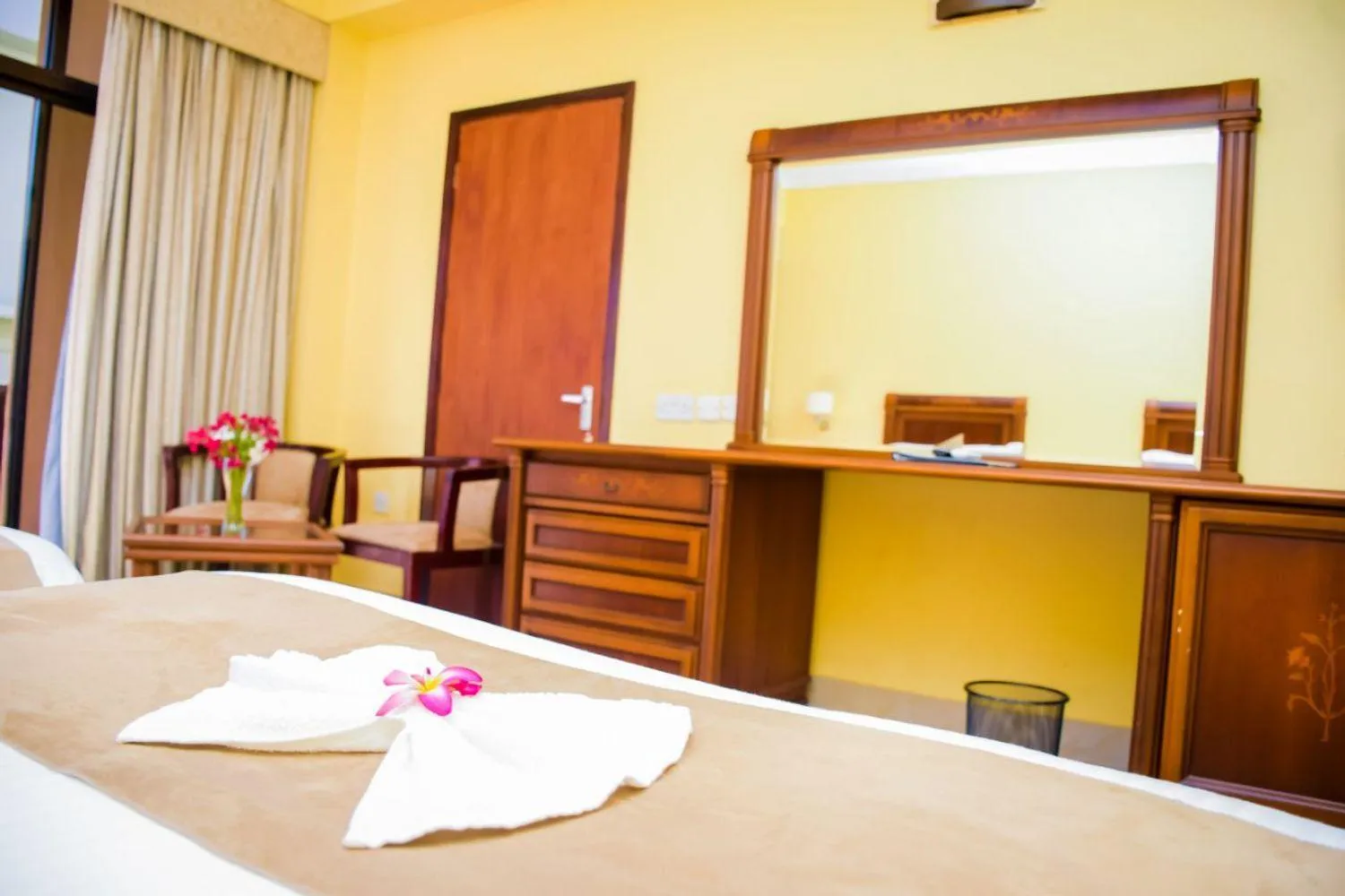 Photo of the whole room, TV/Entertainment Center in Golden Tulip Tanzania