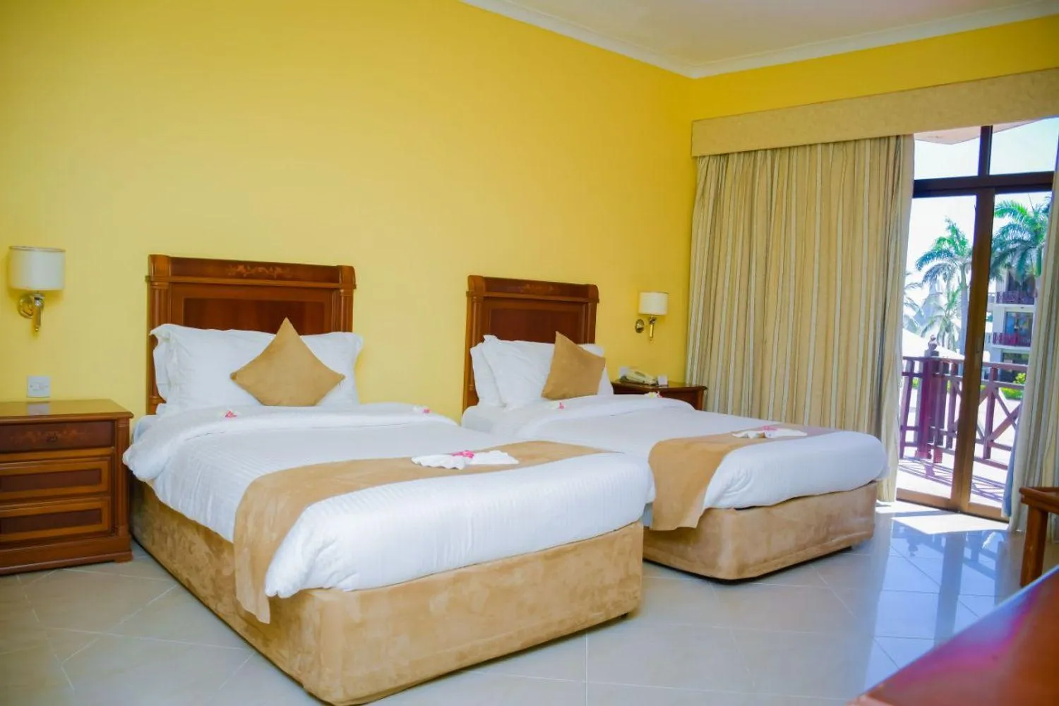 Bed in Golden Tulip Tanzania