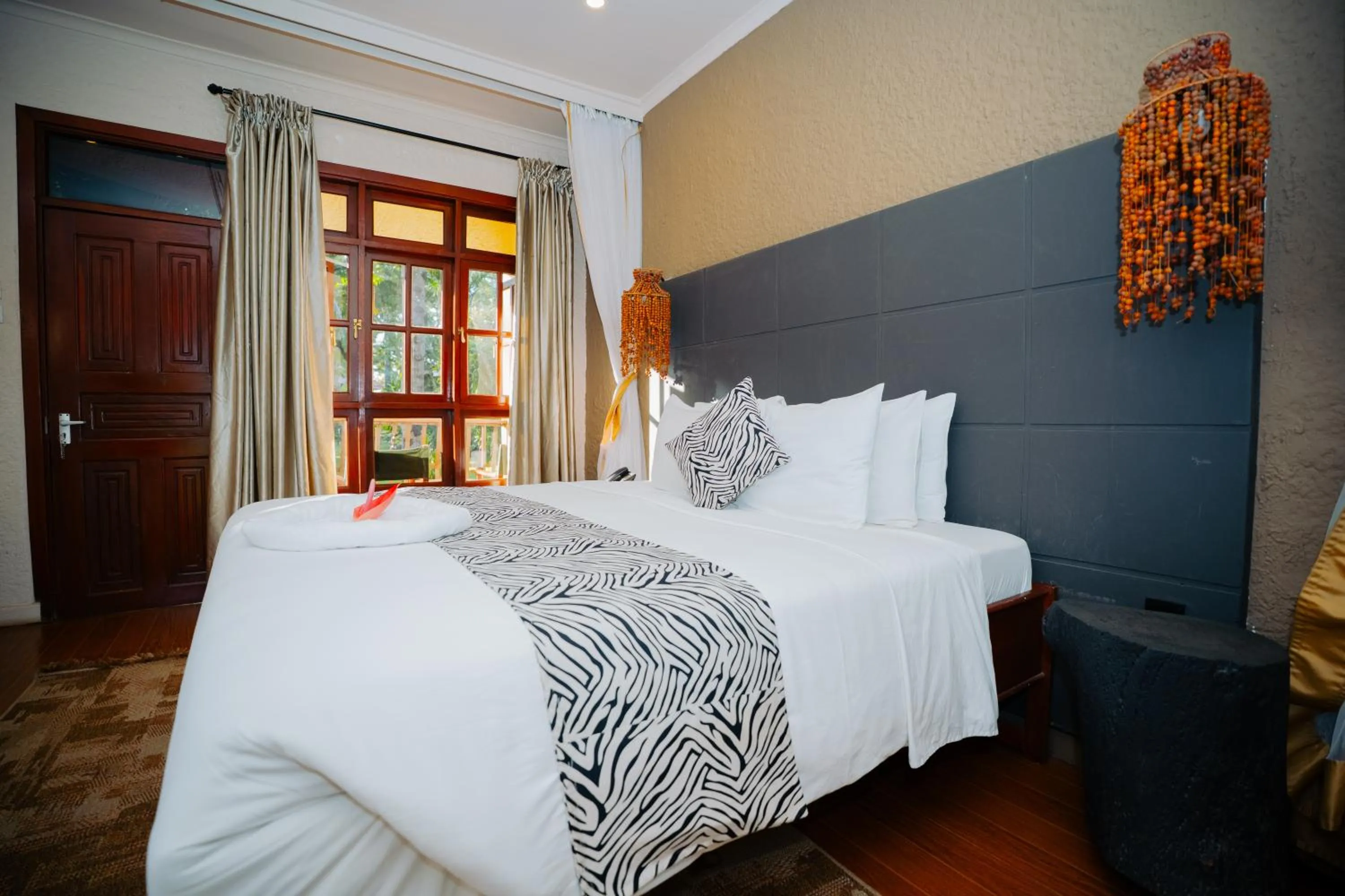 Bed in Arusha Planet Lodge