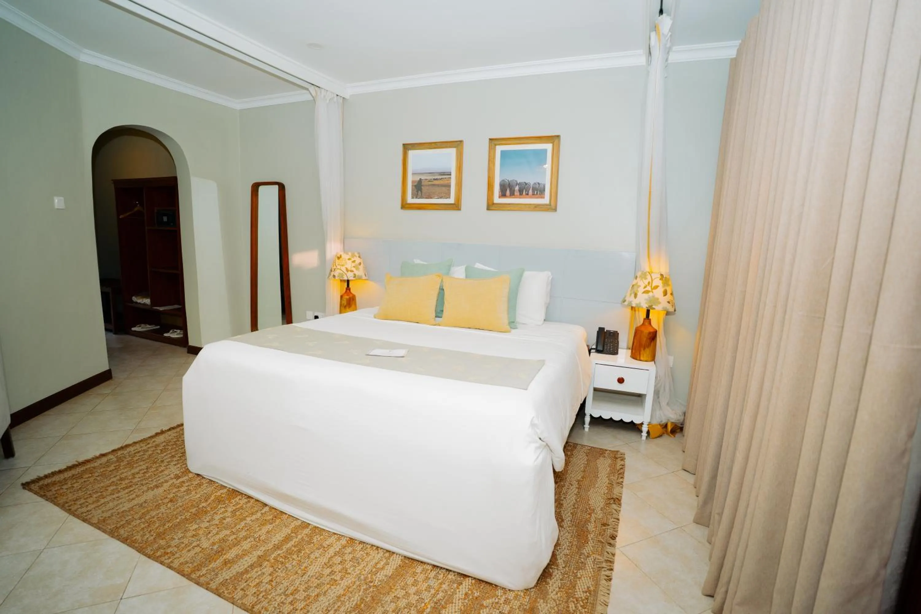 Bed in Arusha Planet Lodge