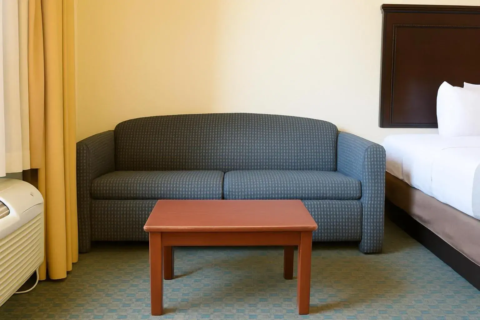 Room with Two Queen Beds with Sofa Bed - Non-Smoking in Ambassador Inn & Suites Tuscaloosa University I-20 Room with Two Queen Beds with Sofa Bed - Non-Smoking in Ambassador Inn & Suites Tuscaloosa University I-20