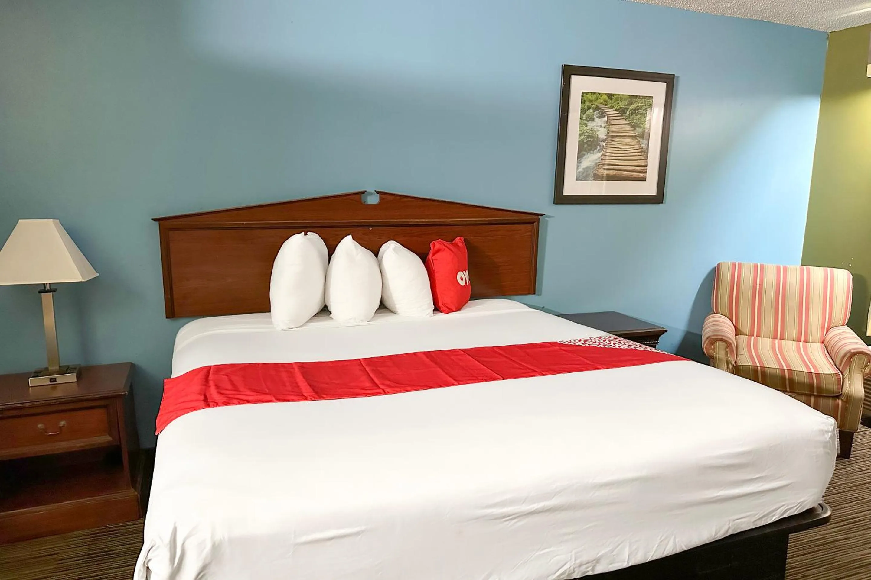 Bedroom, Bed in Bonita Lakes Inn by Capital O Meridian I20