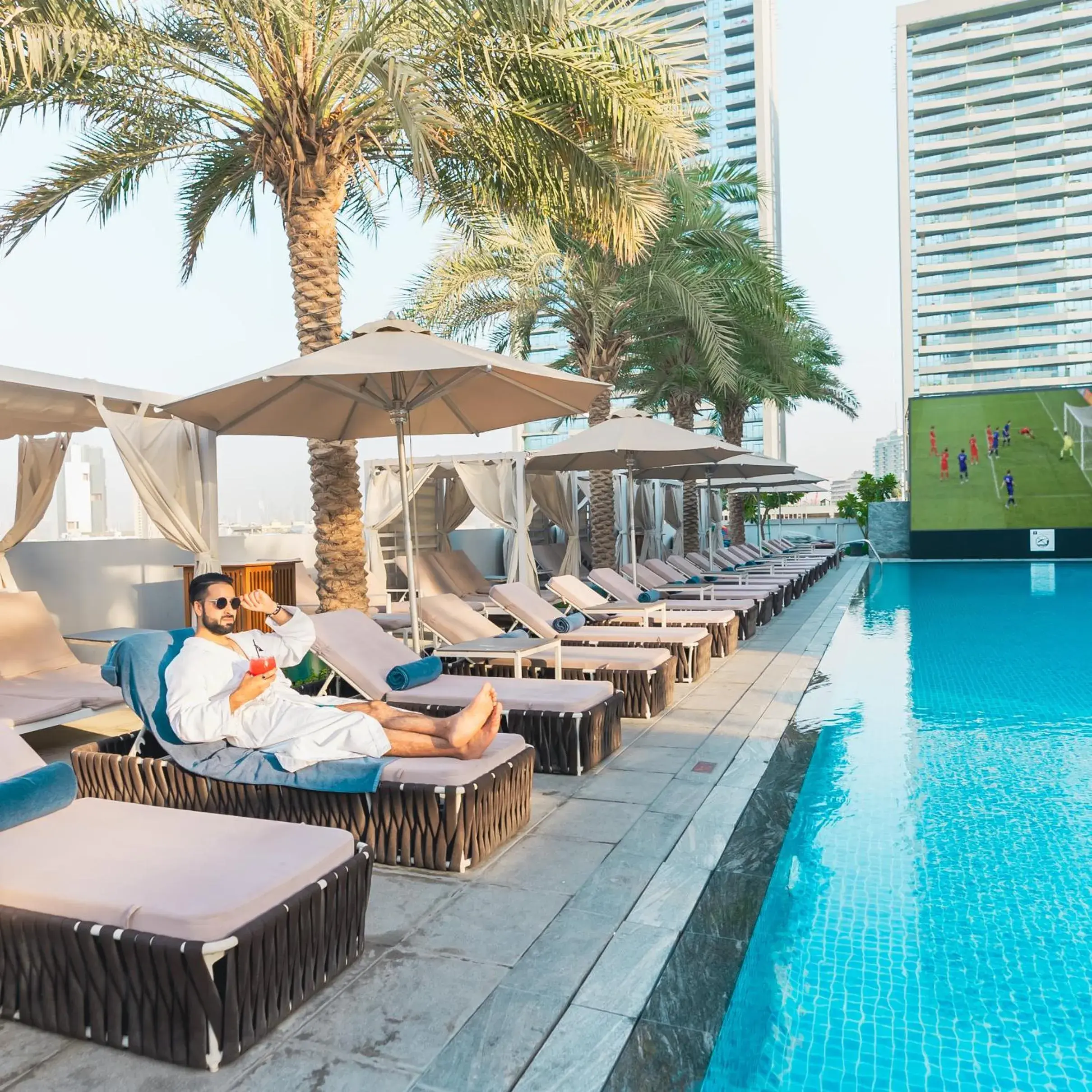 Swimming pool in The First Collection Dubai Jumeirah Village Circle, a Tribute Portfolio Hotel Swimming pool in The First Collection Dubai Jumeirah Village Circle, a Tribute Portfolio Hotel
