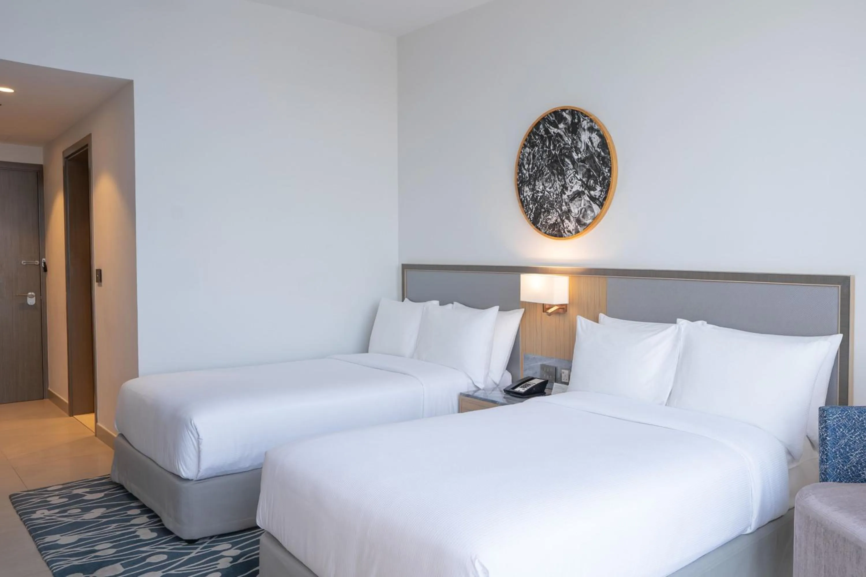 Photo of the whole room, Bed in The First Collection Dubai Jumeirah Village Circle, a Tribute Portfolio Hotel