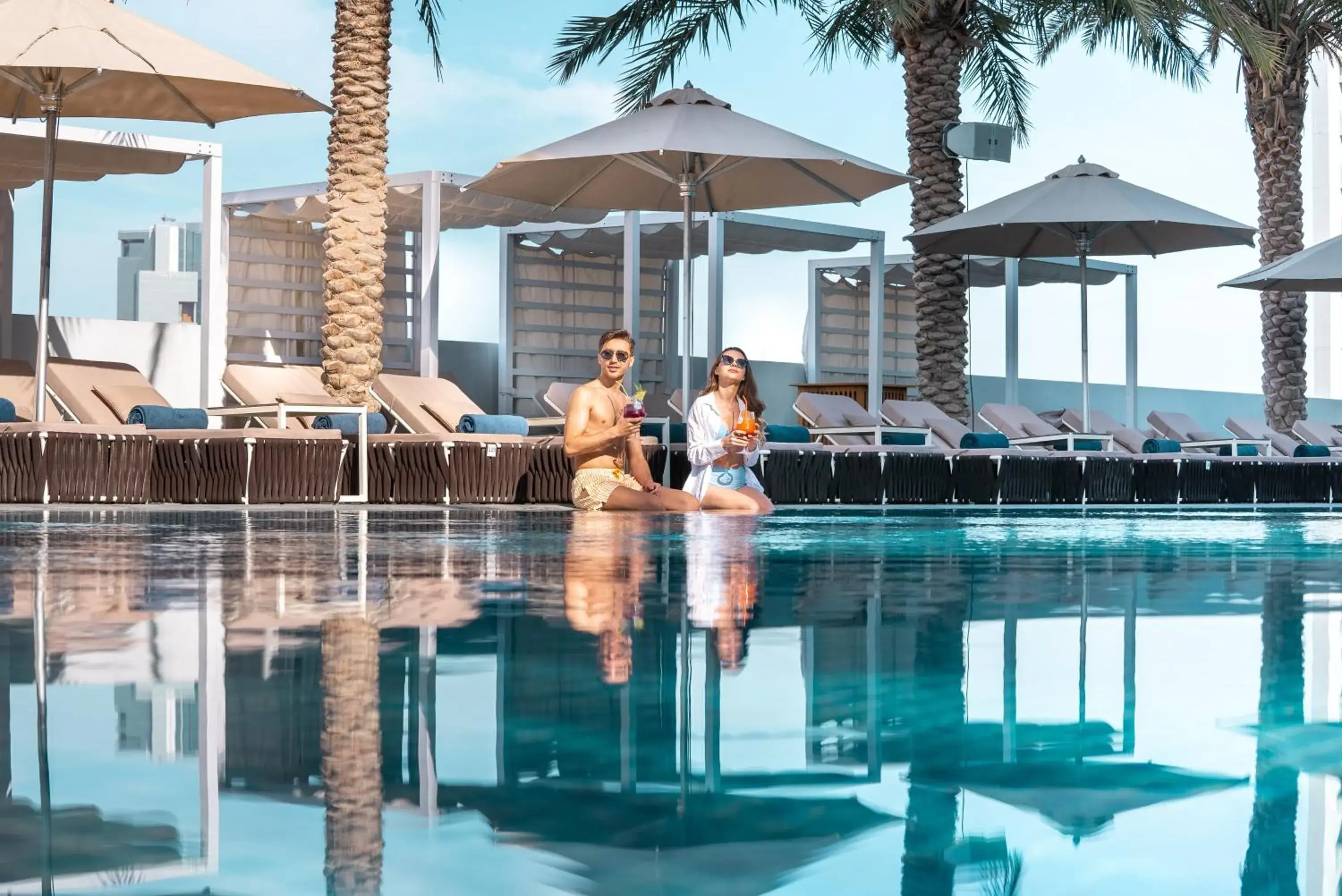 Swimming pool in The First Collection Dubai Jumeirah Village Circle, a Tribute Portfolio Hotel Swimming pool in The First Collection Dubai Jumeirah Village Circle, a Tribute Portfolio Hotel