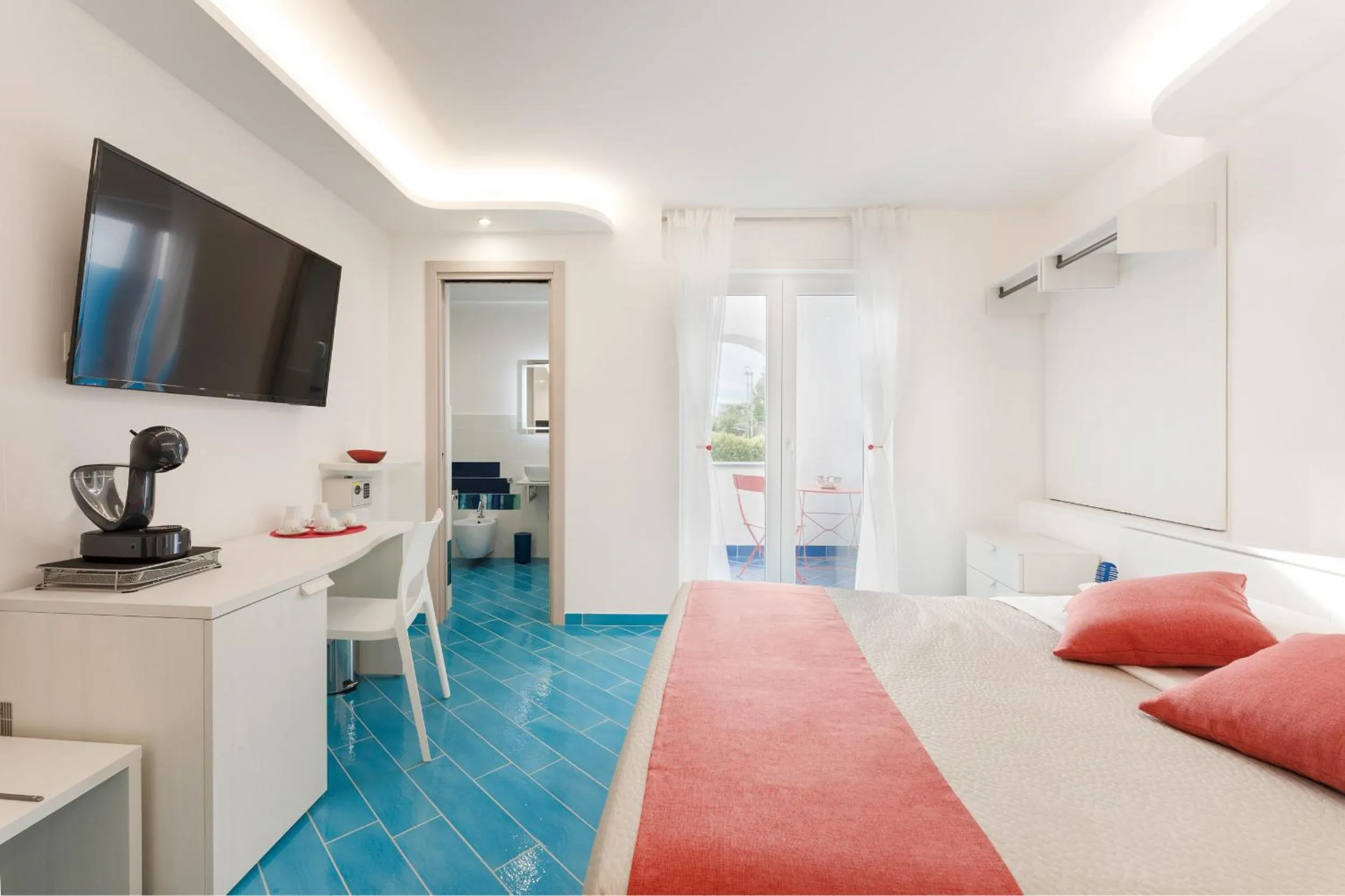 Bed in Il Corallo Residence