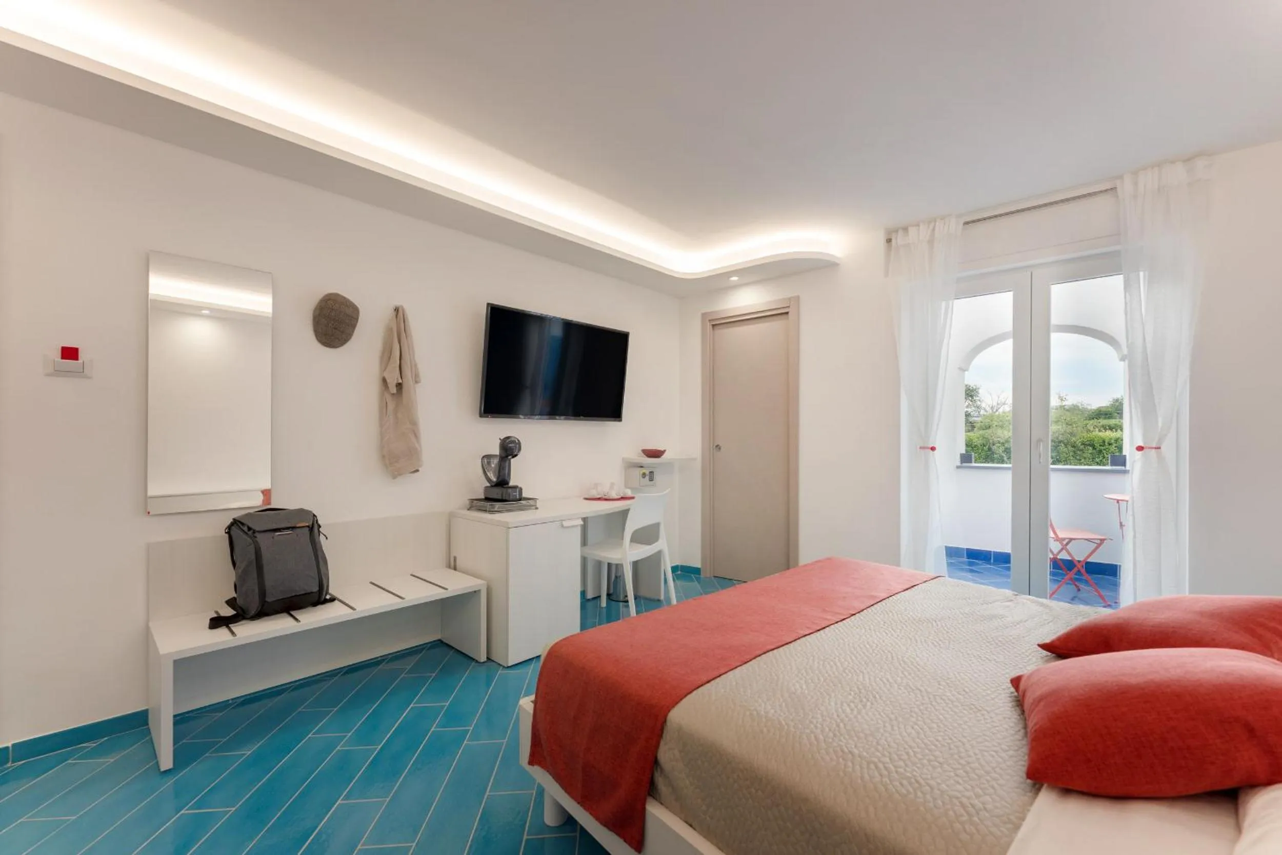 Bed in Il Corallo Residence