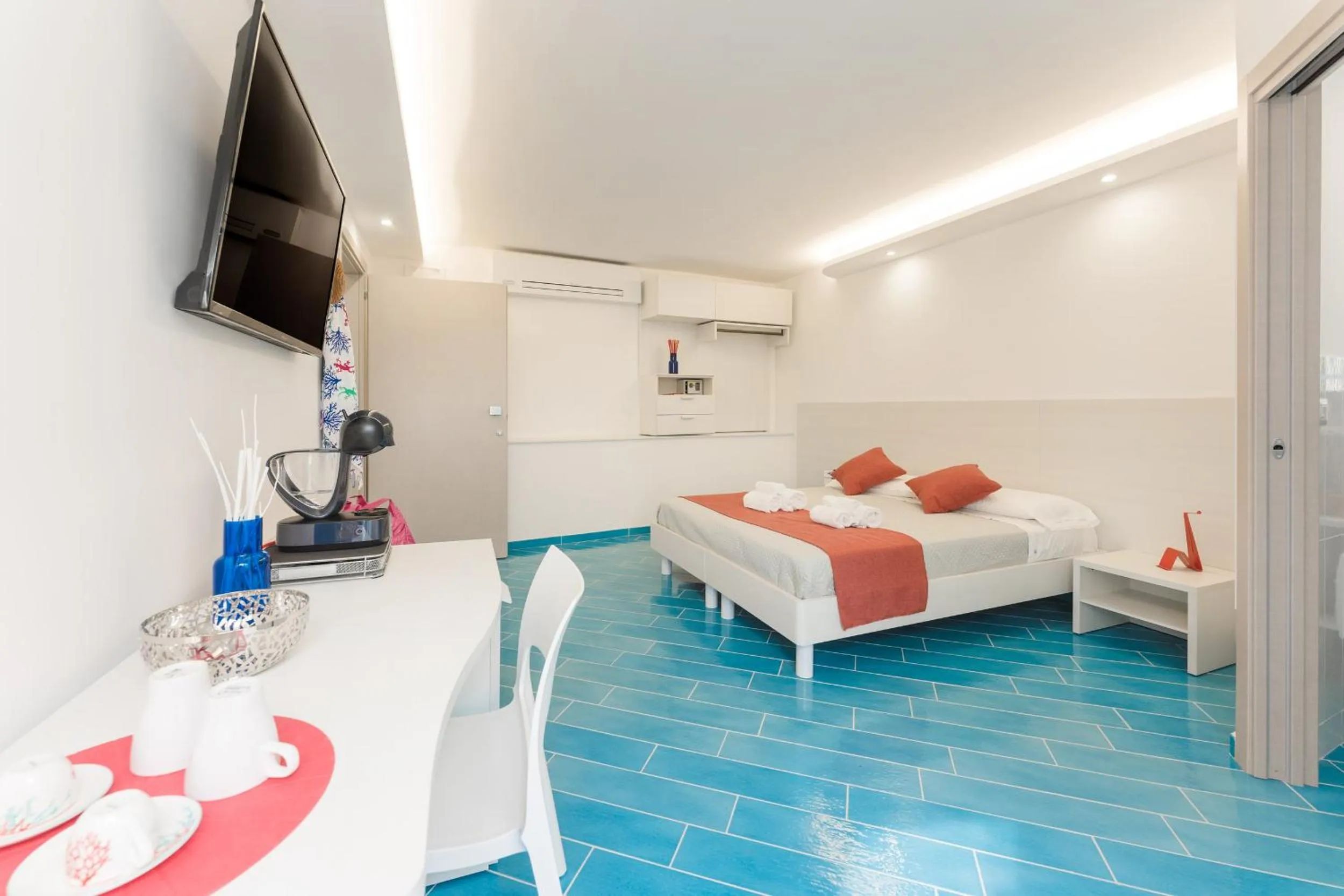 Bed in Il Corallo Residence