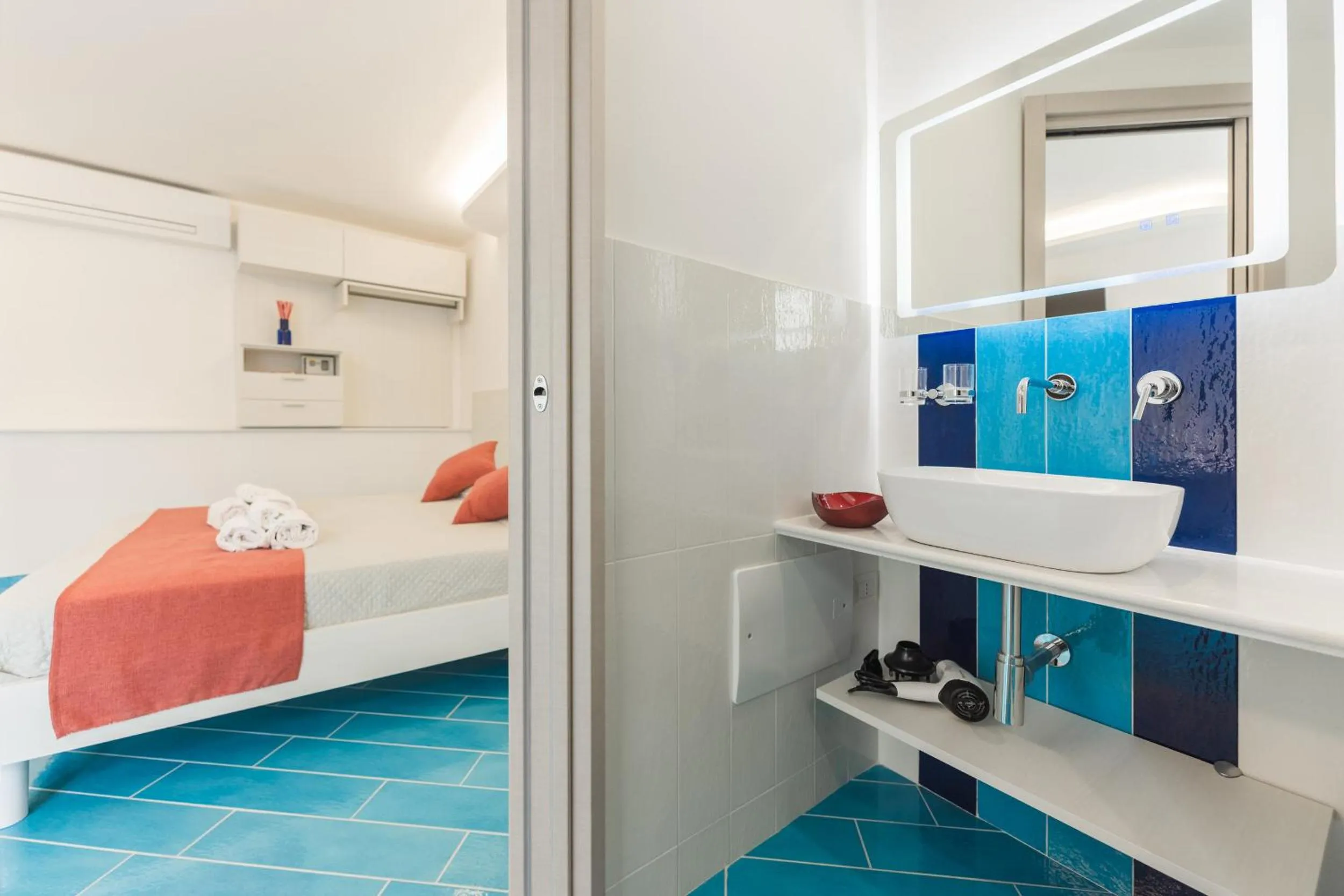 Bed in Il Corallo Residence