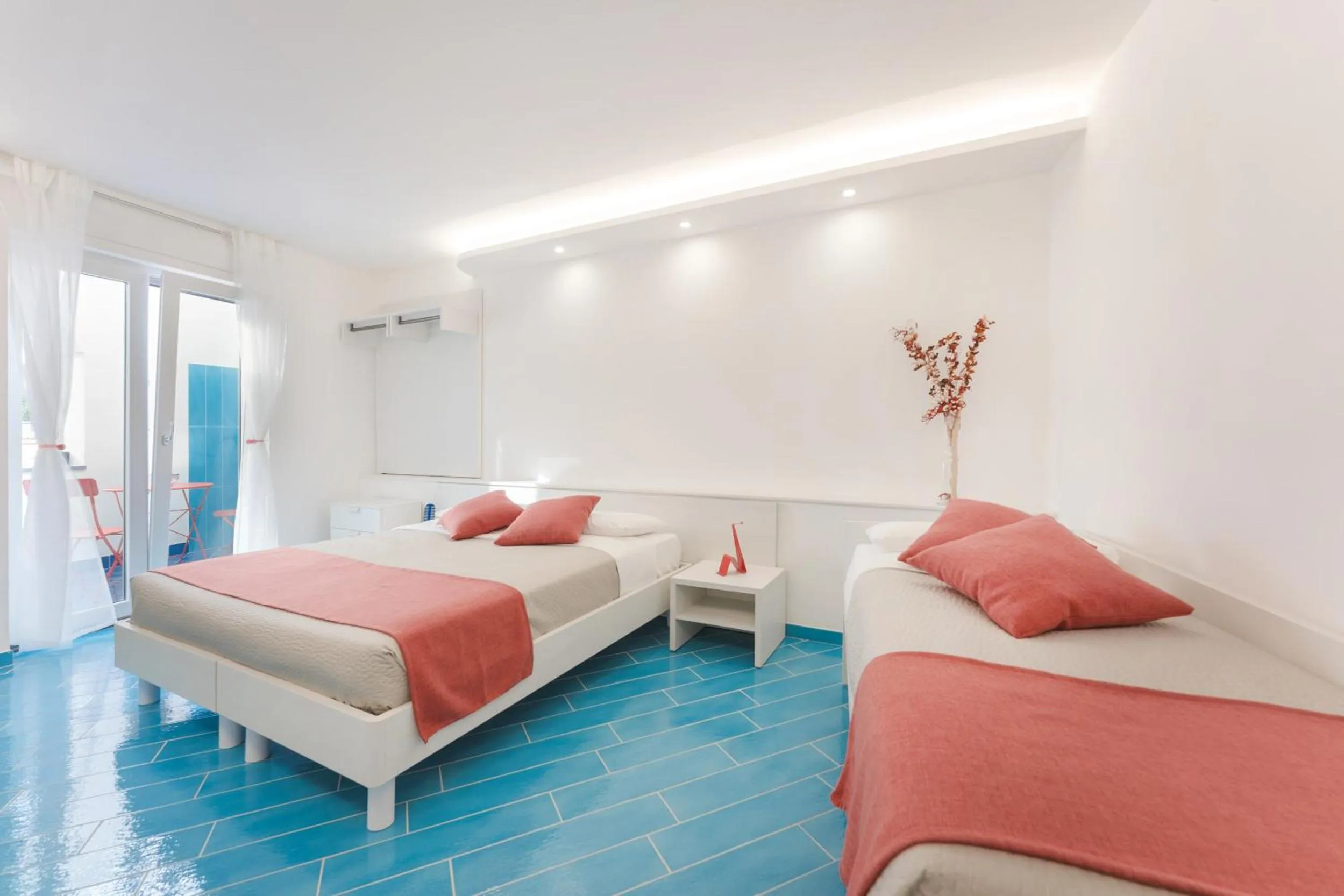 Bed in Il Corallo Residence