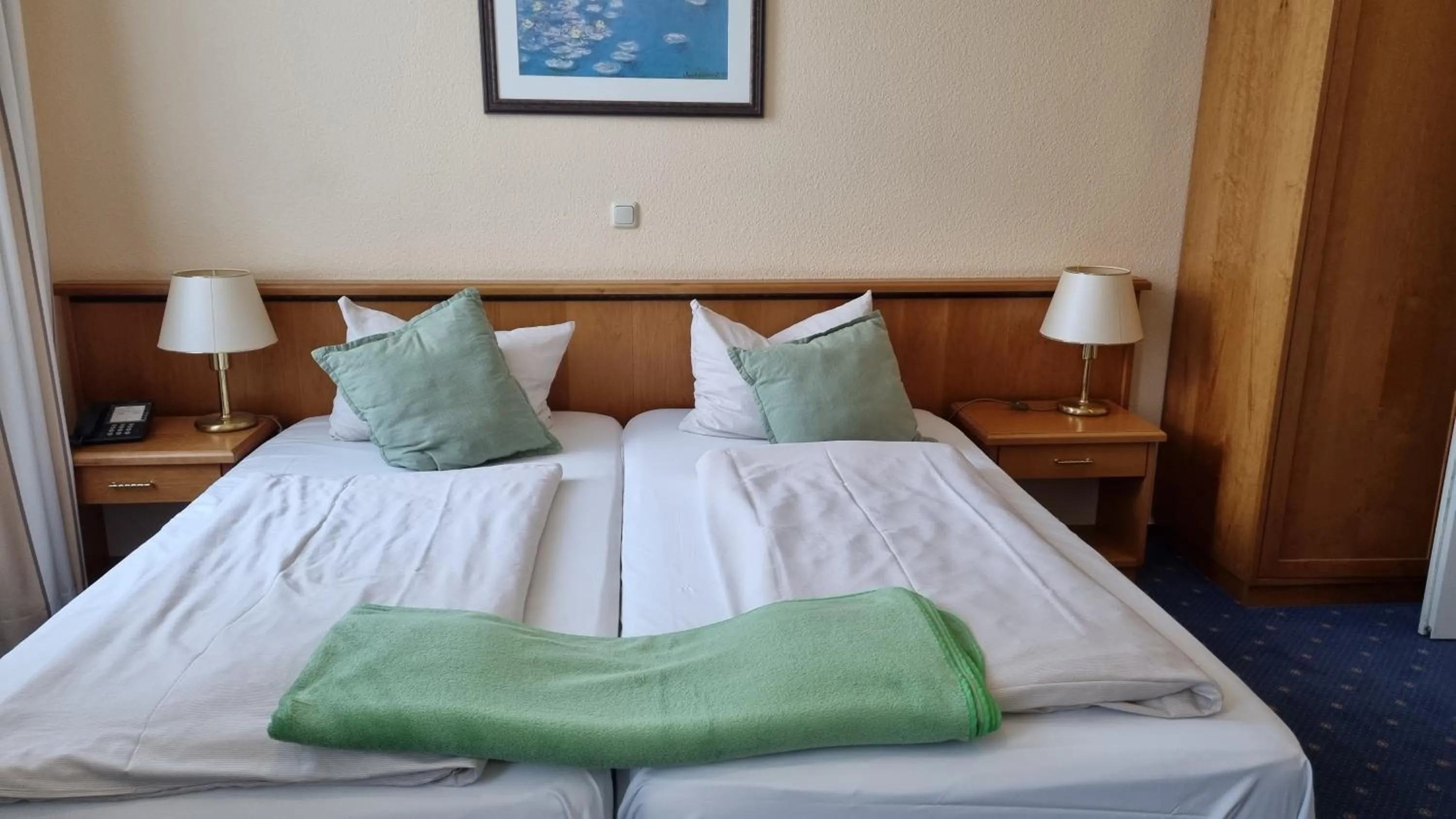 Bed in Residenzia Hotel Grenadier