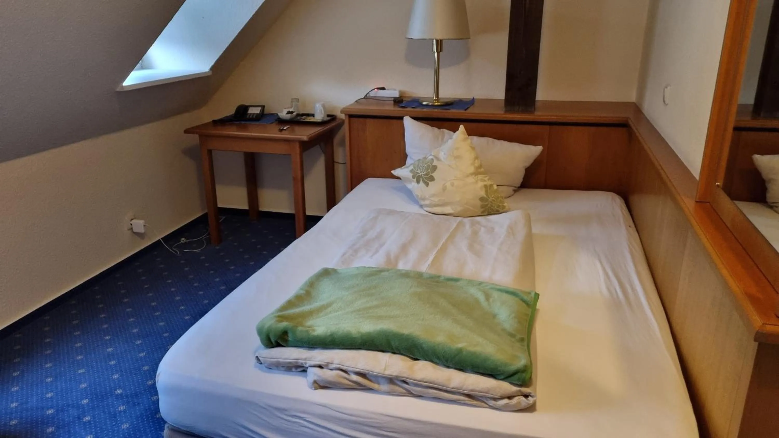 Bed in Residenzia Hotel Grenadier