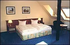 Bed in Residenzia Hotel Grenadier