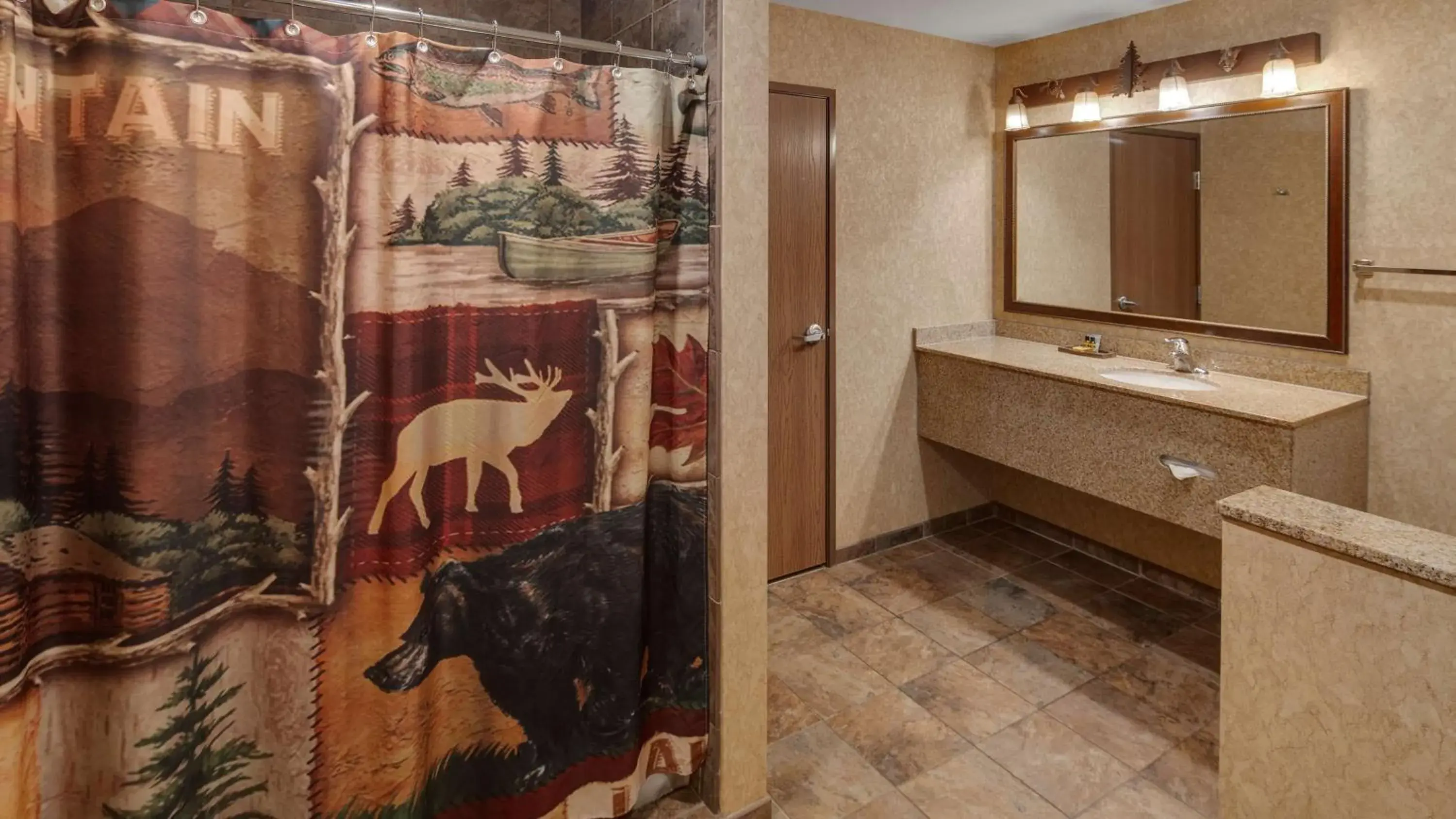 Bathroom in Best Western Plus Kelly Inn and Suites Bathroom in Best Western Plus Kelly Inn and Suites