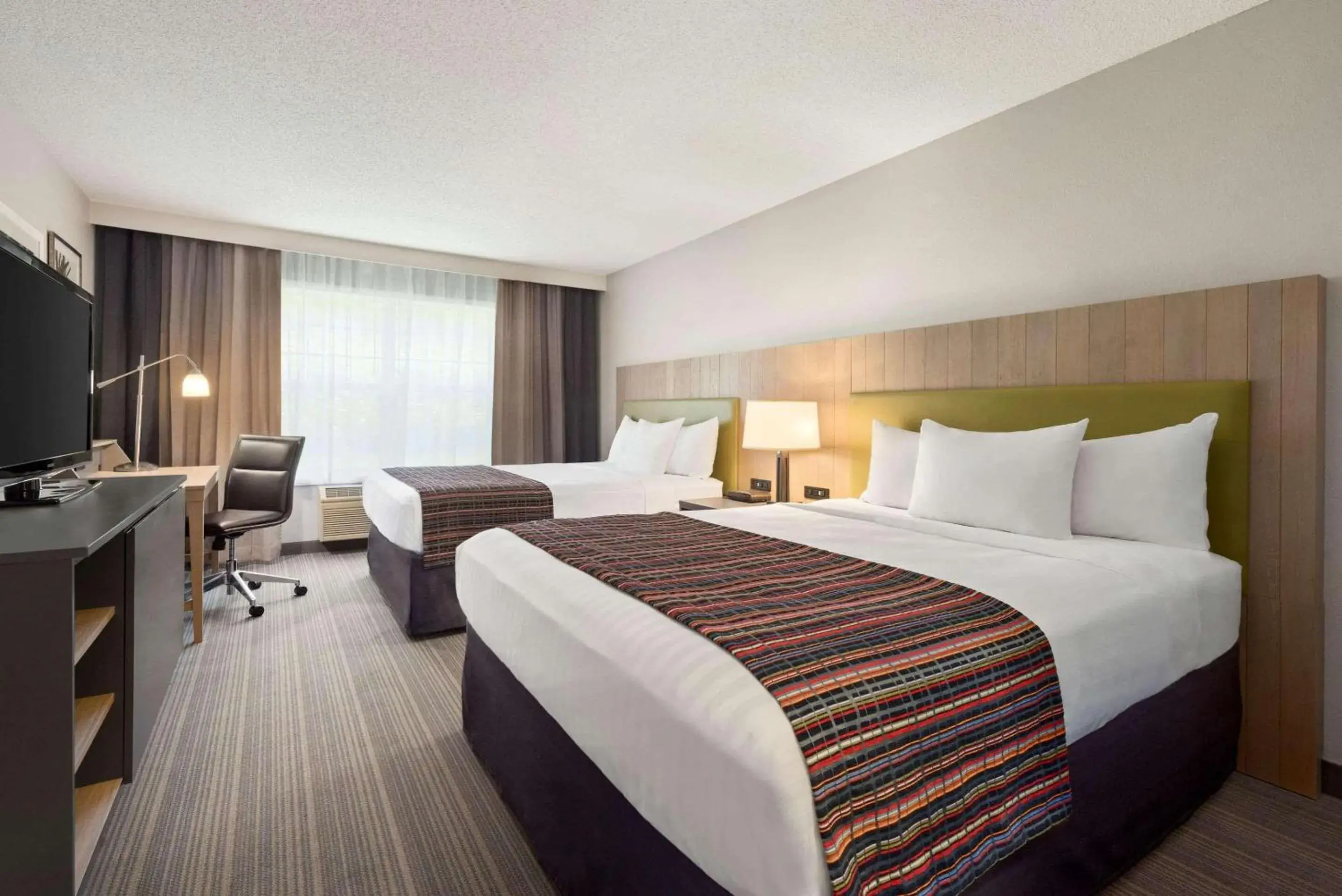 Bedroom, Bed in Country Inn & Suites by Radisson, Decorah, IA Bedroom, Bed in Country Inn & Suites by Radisson, Decorah, IA