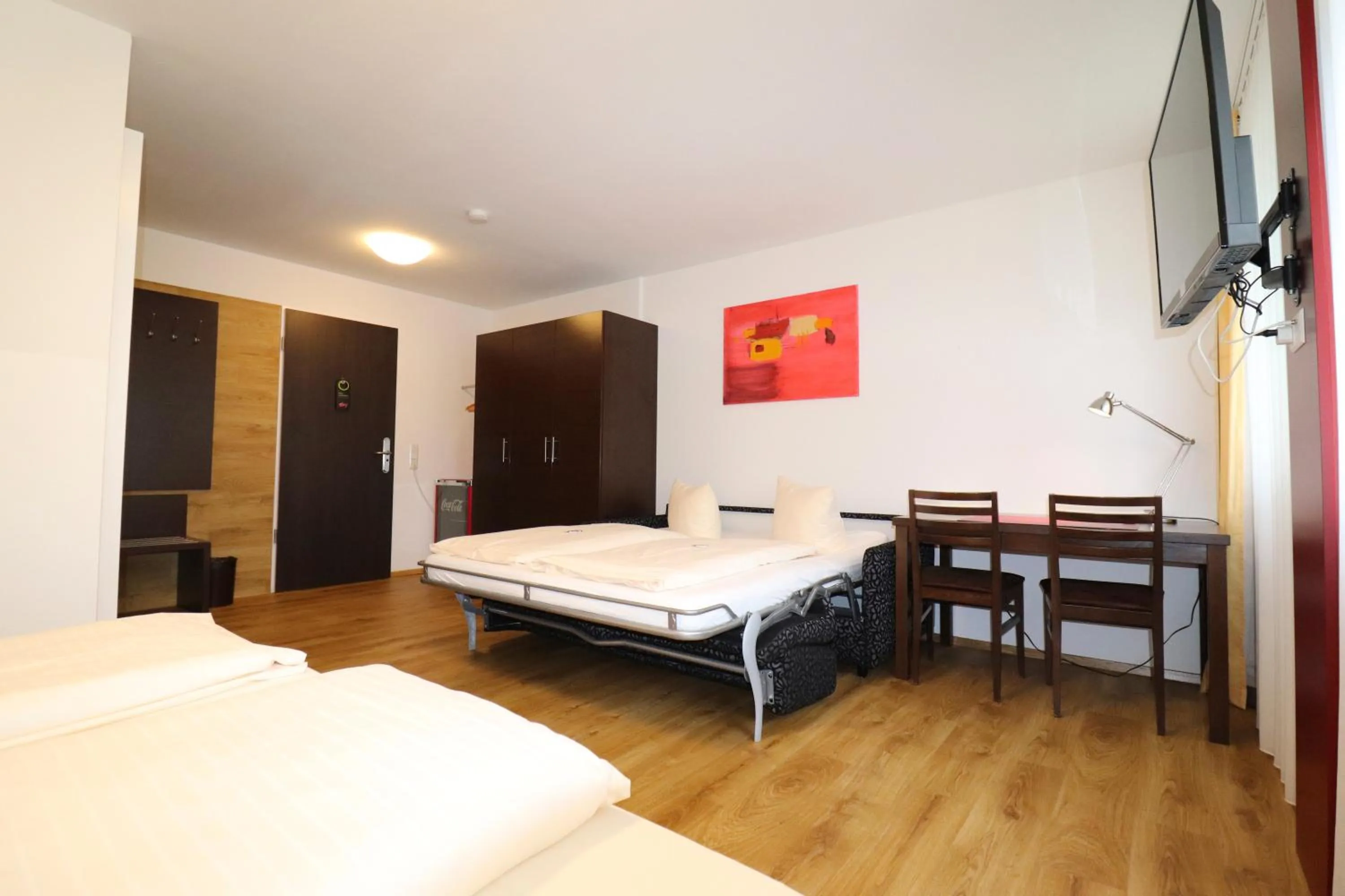 Property building, Bed in iQ-Hotel