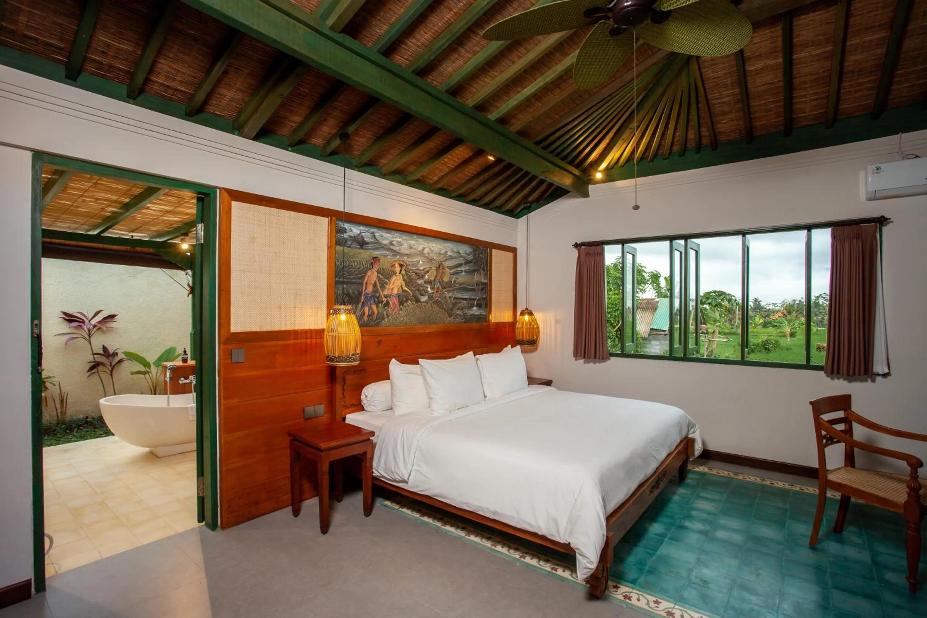 Photo of the whole room, Bed in Arya Arkananta Resort & Spa