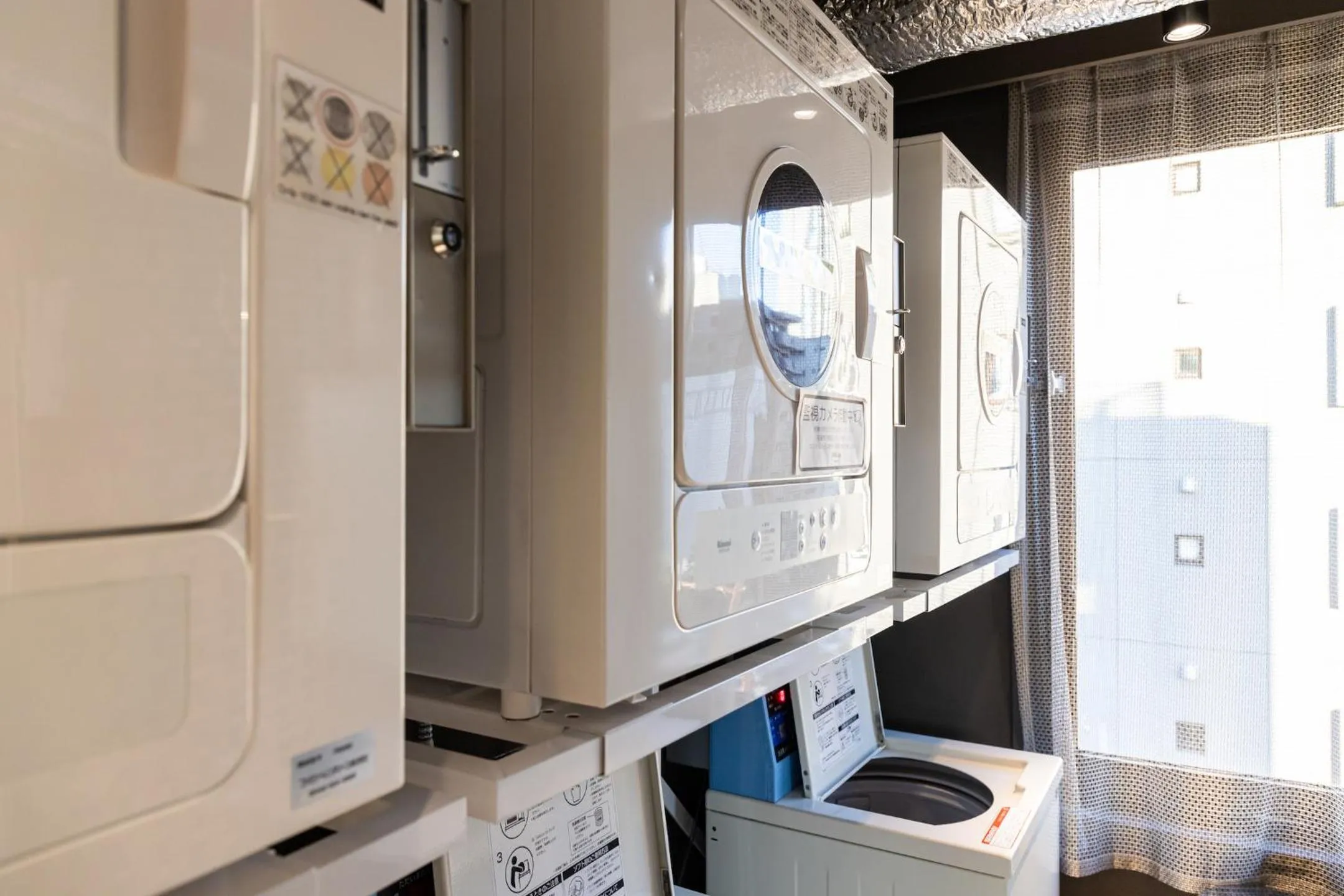 Communal lounge/ TV room in UNPLAN Fukuoka