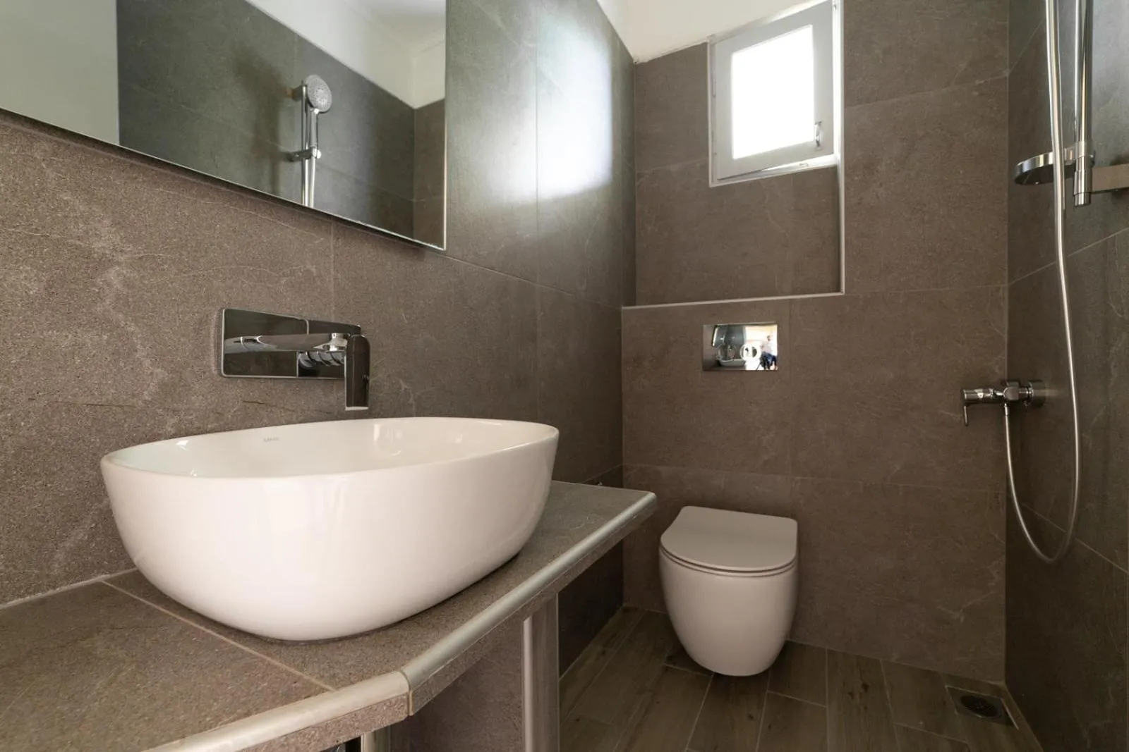Bathroom in NewStory Suites Possidi
