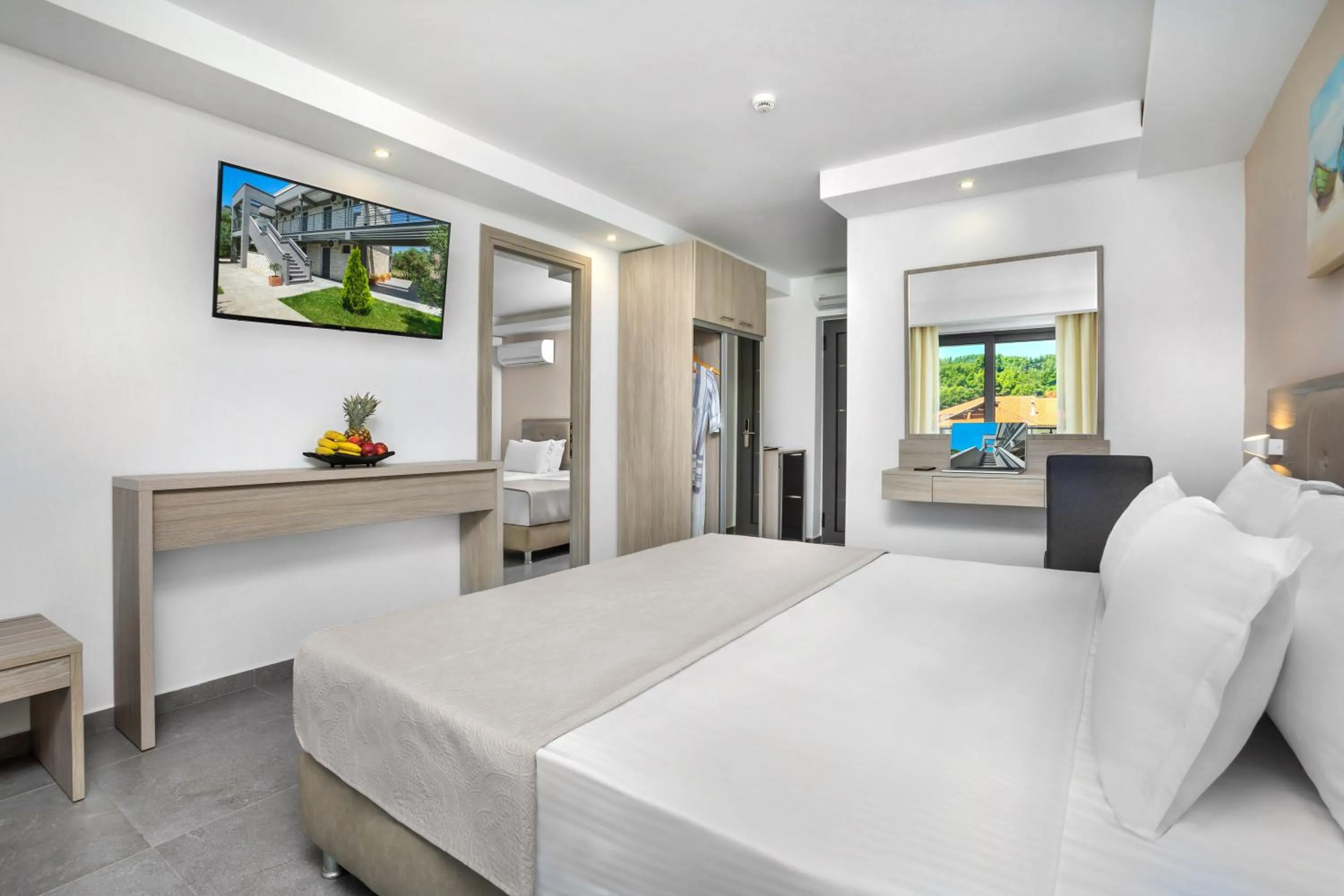 Bed in NewStory Suites Possidi