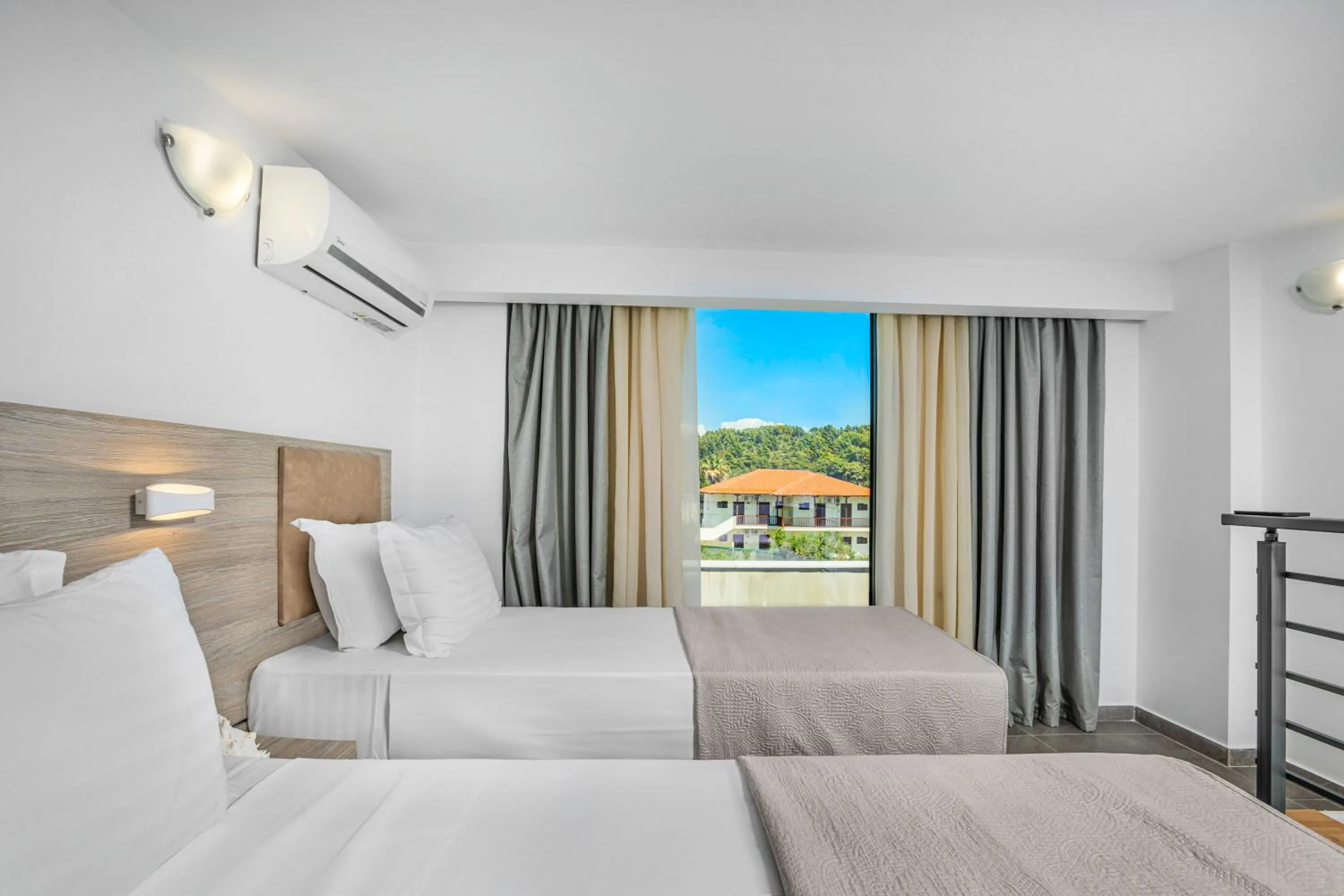 Bedroom, Bed in NewStory Suites Possidi