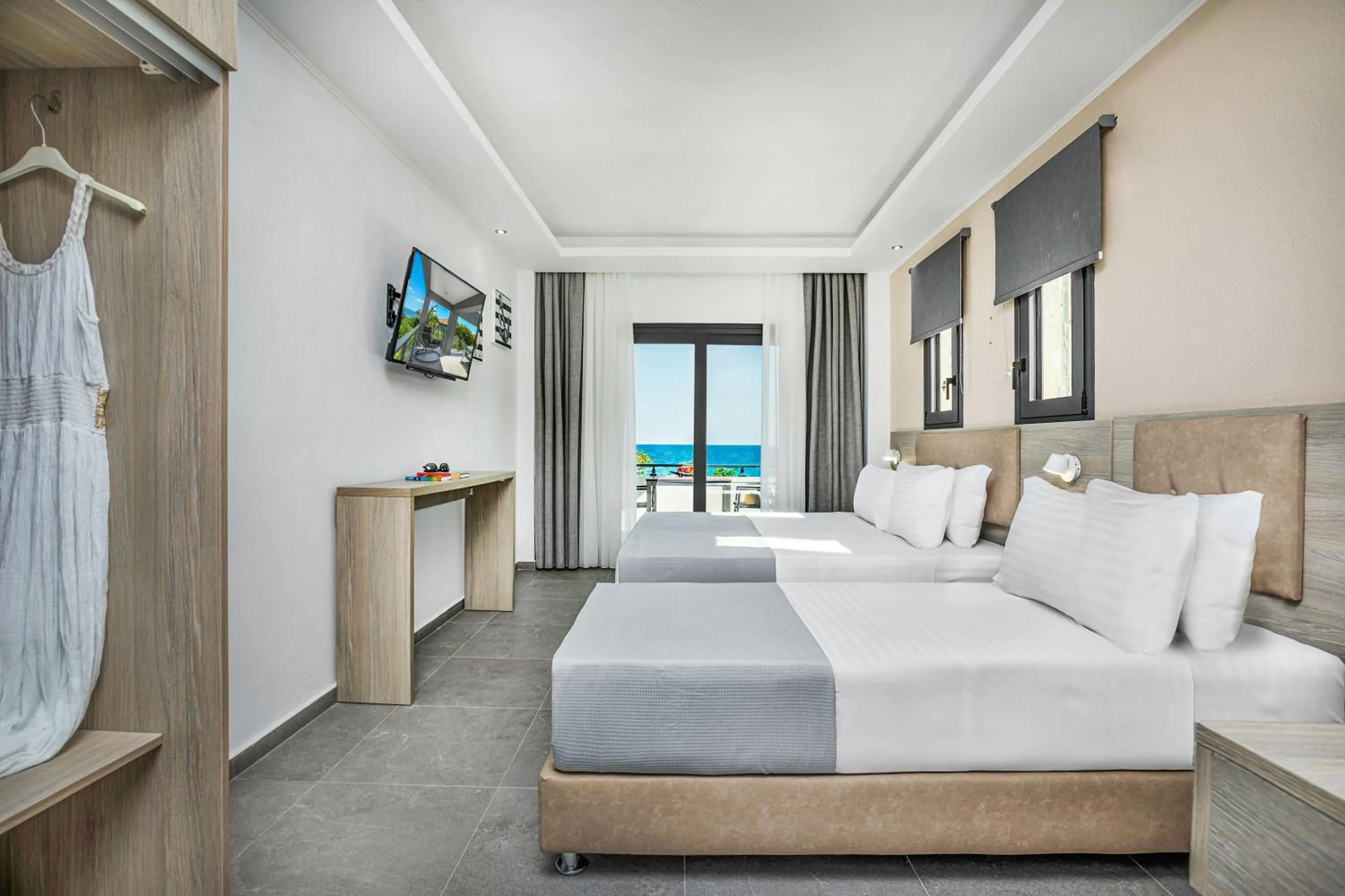 Photo of the whole room, Bed in NewStory Suites Possidi