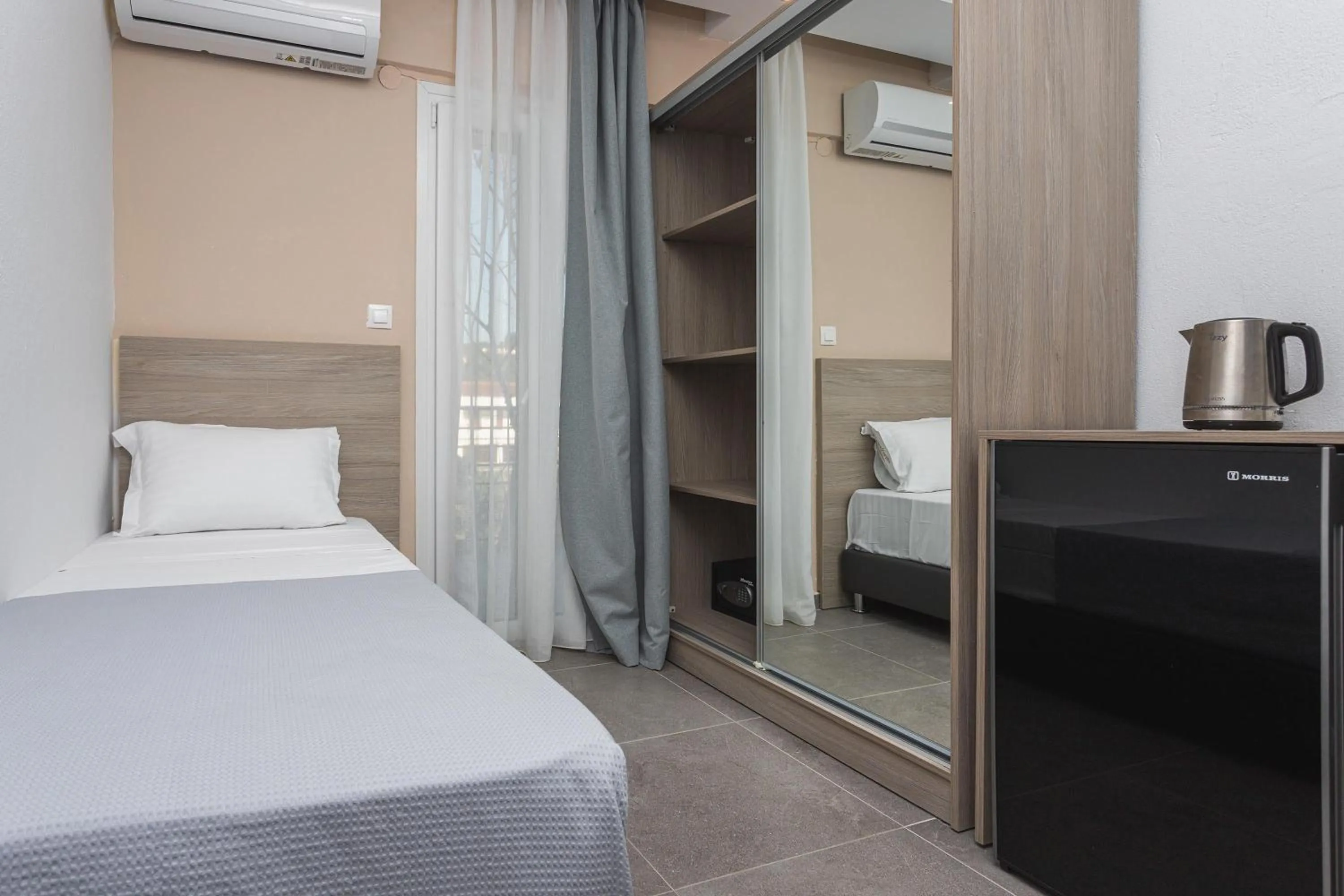 Bed in NewStory Suites Possidi