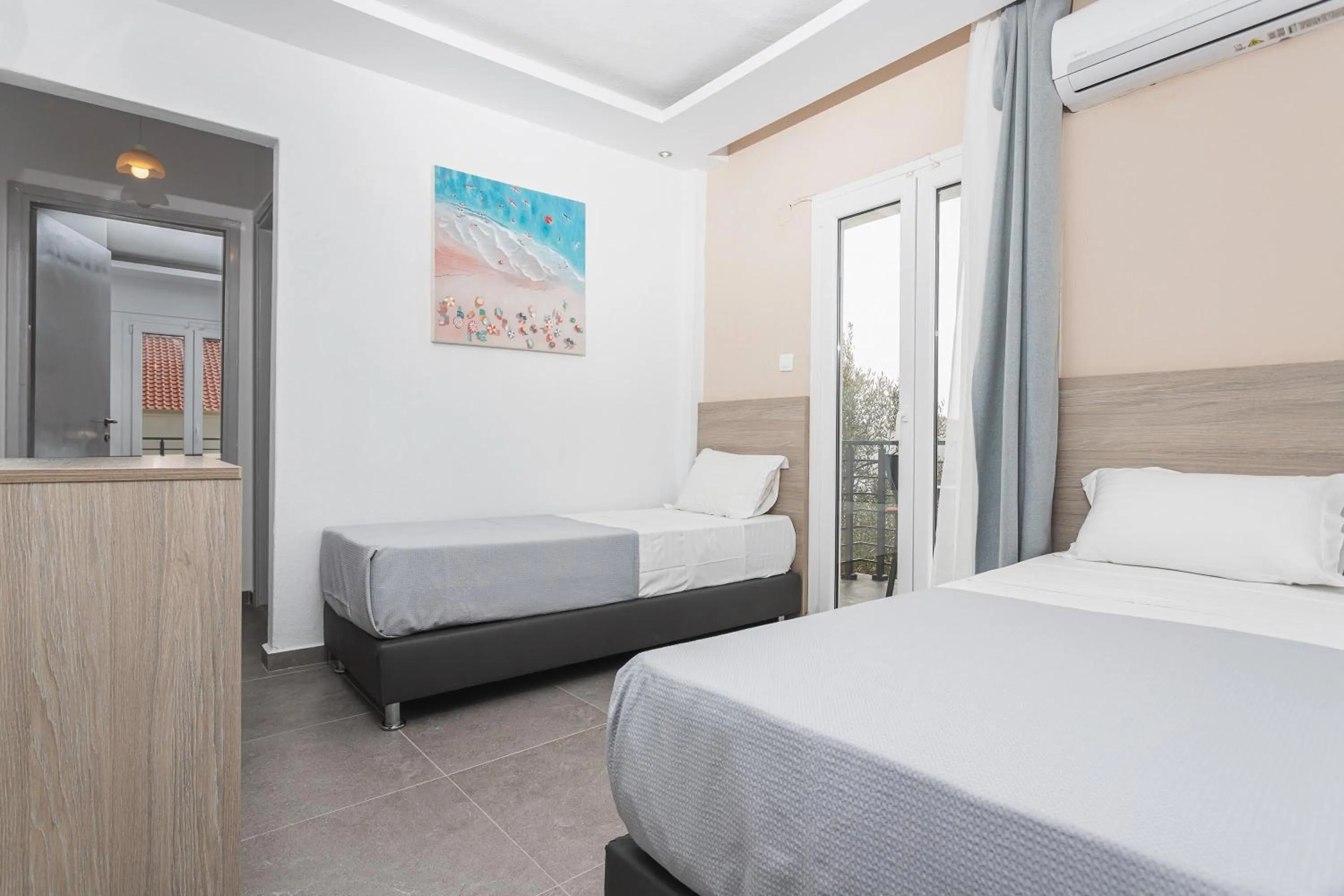 Bedroom, Bed in NewStory Suites Possidi