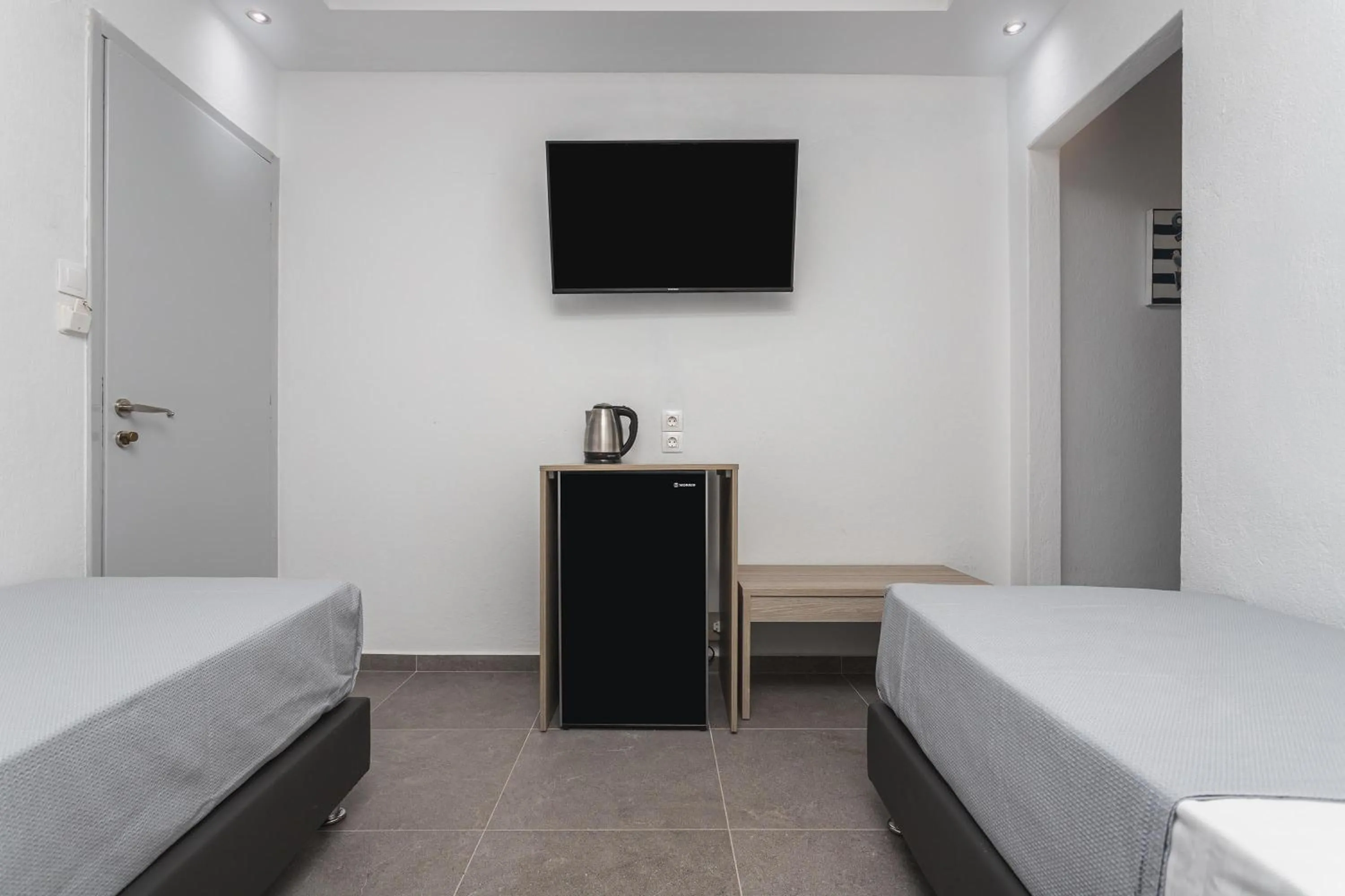 Bedroom, Bed in NewStory Suites Possidi