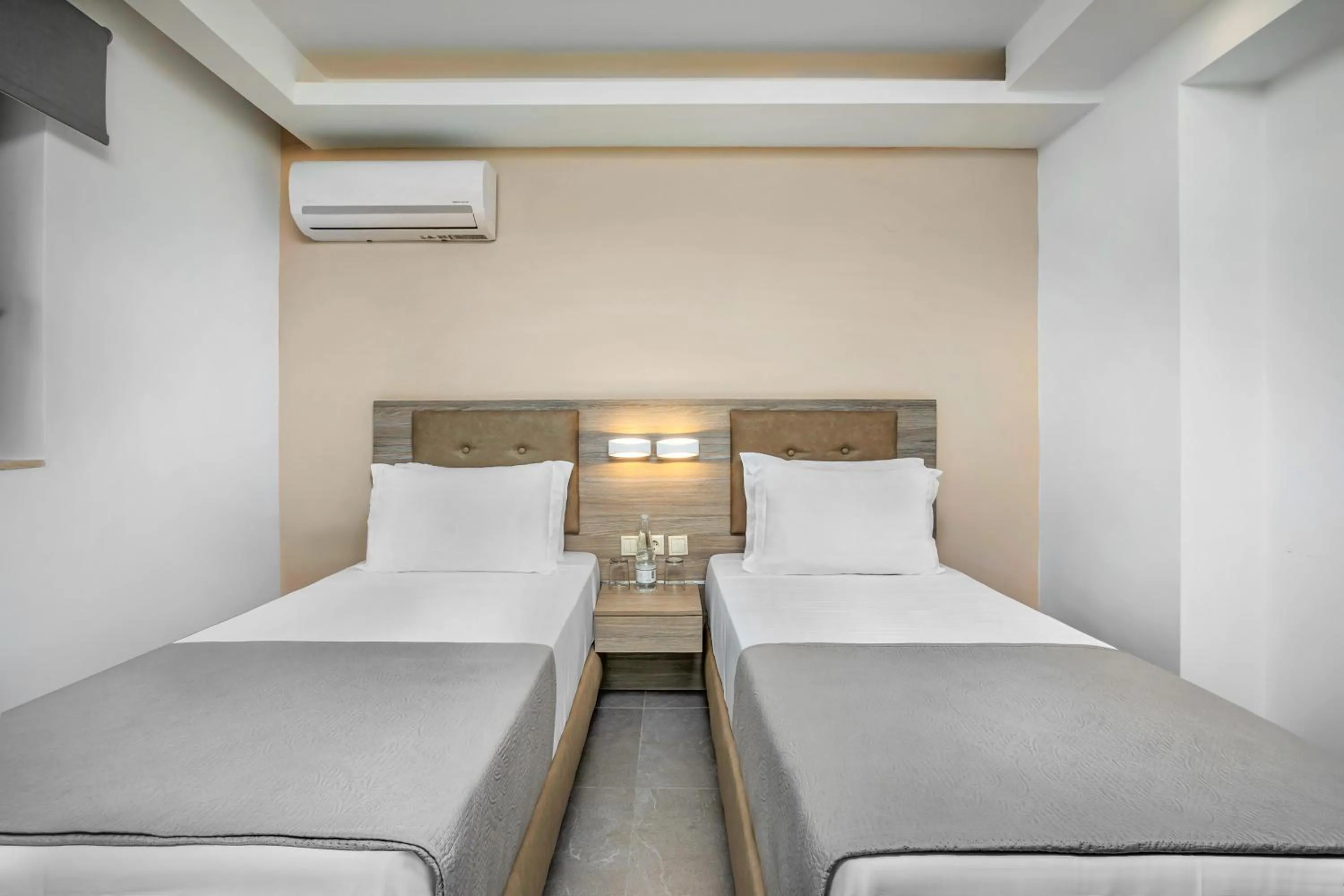 Bed in NewStory Suites Possidi
